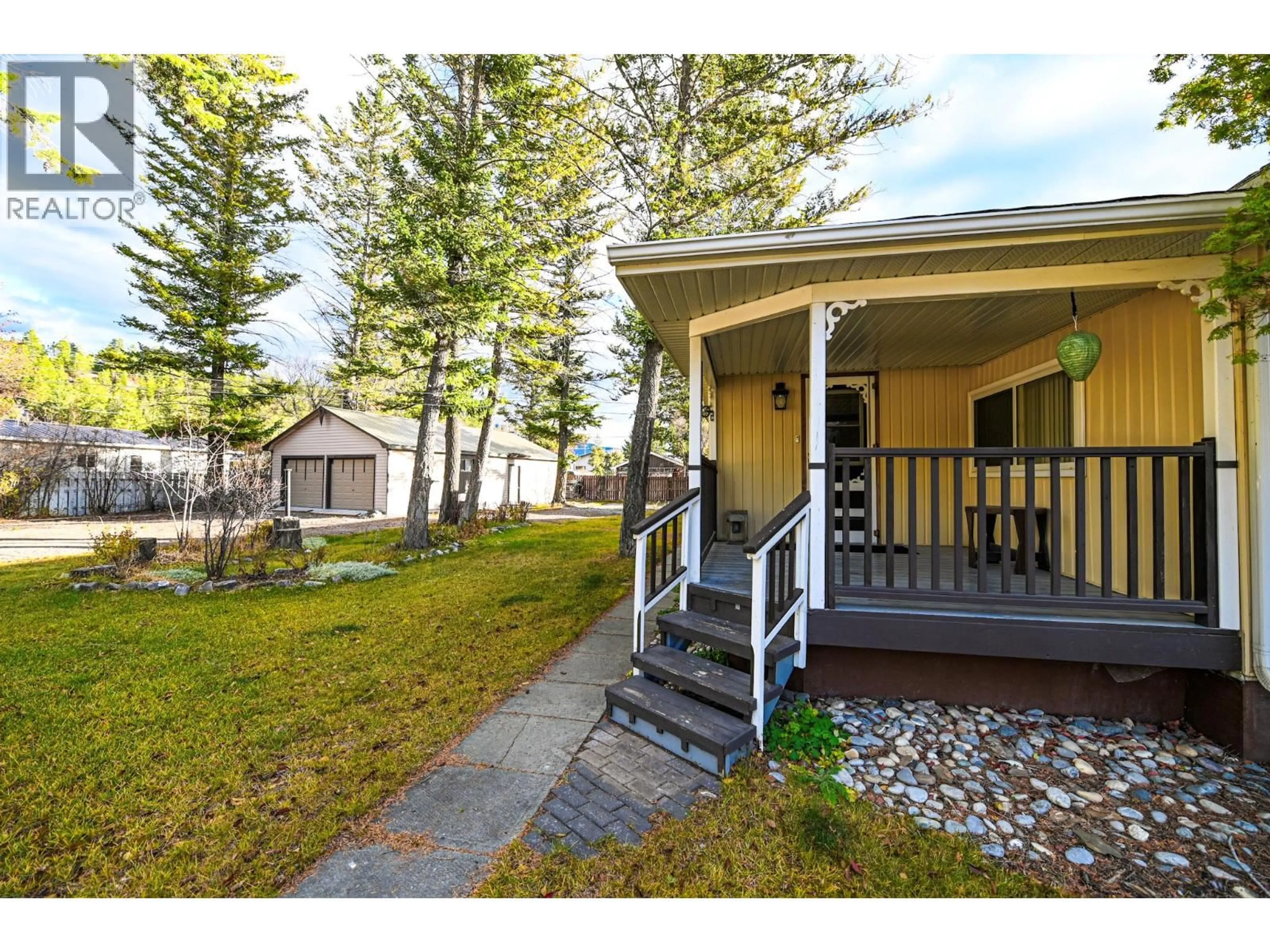 A pic from outside/outdoor area/front of a property/back of a property/a pic from drone, street for 4982 SPRUCE AVENUE, Canal Flats British Columbia V0B1B0