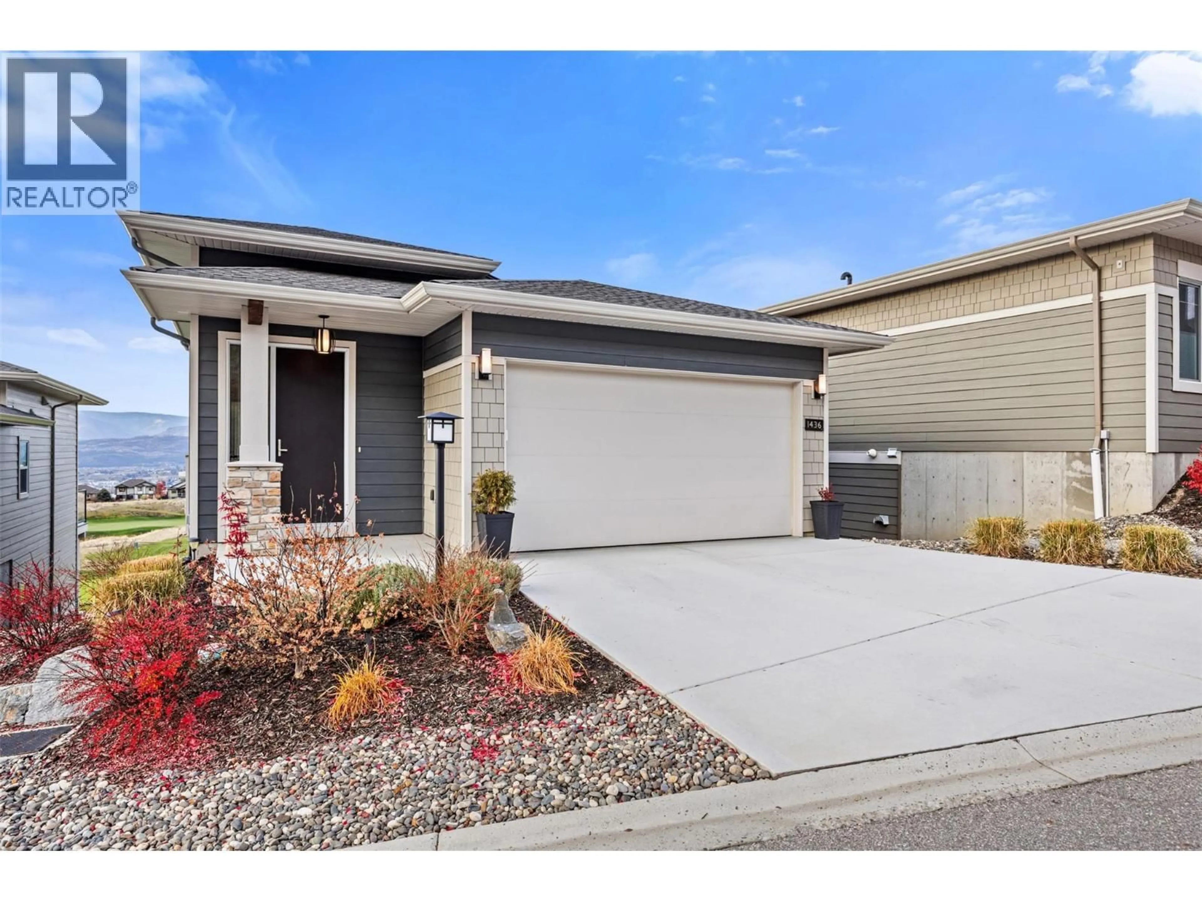 Home with vinyl exterior material, street for 1436 TOWER RANCH DRIVE, Kelowna British Columbia V1P1T8