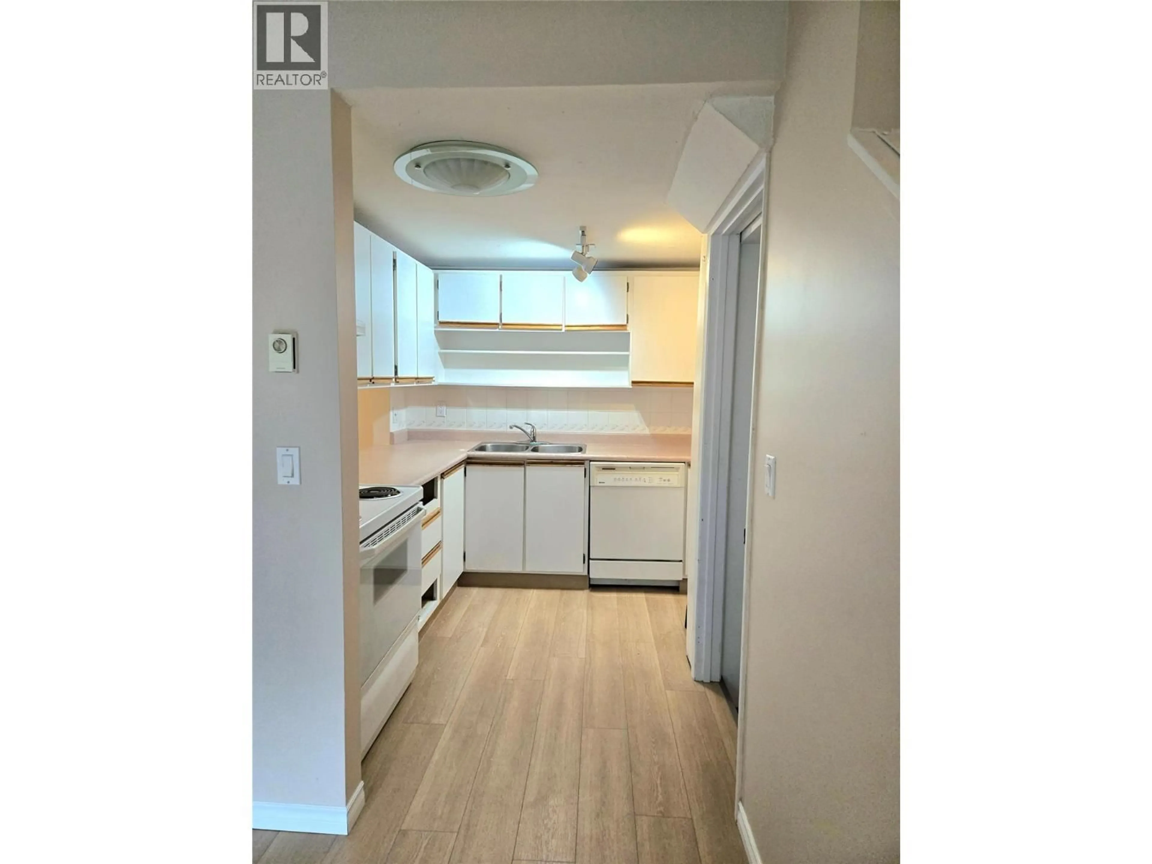 Standard kitchen, wood/laminate floor for 4 - 1471 INKAR ROAD, Kelowna British Columbia V1Y8J1