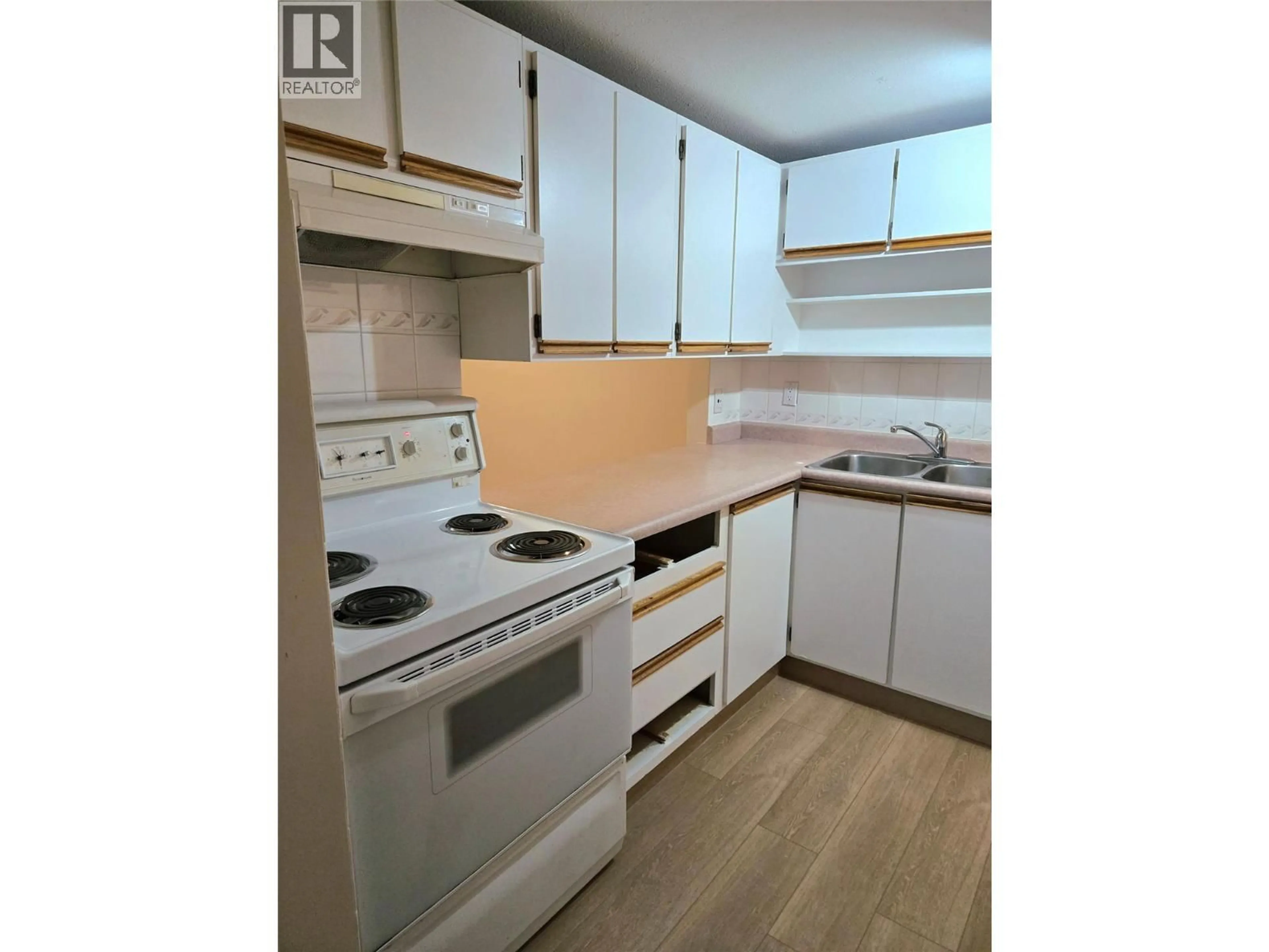 Standard kitchen, wood/laminate floor for 4 - 1471 INKAR ROAD, Kelowna British Columbia V1Y8J1