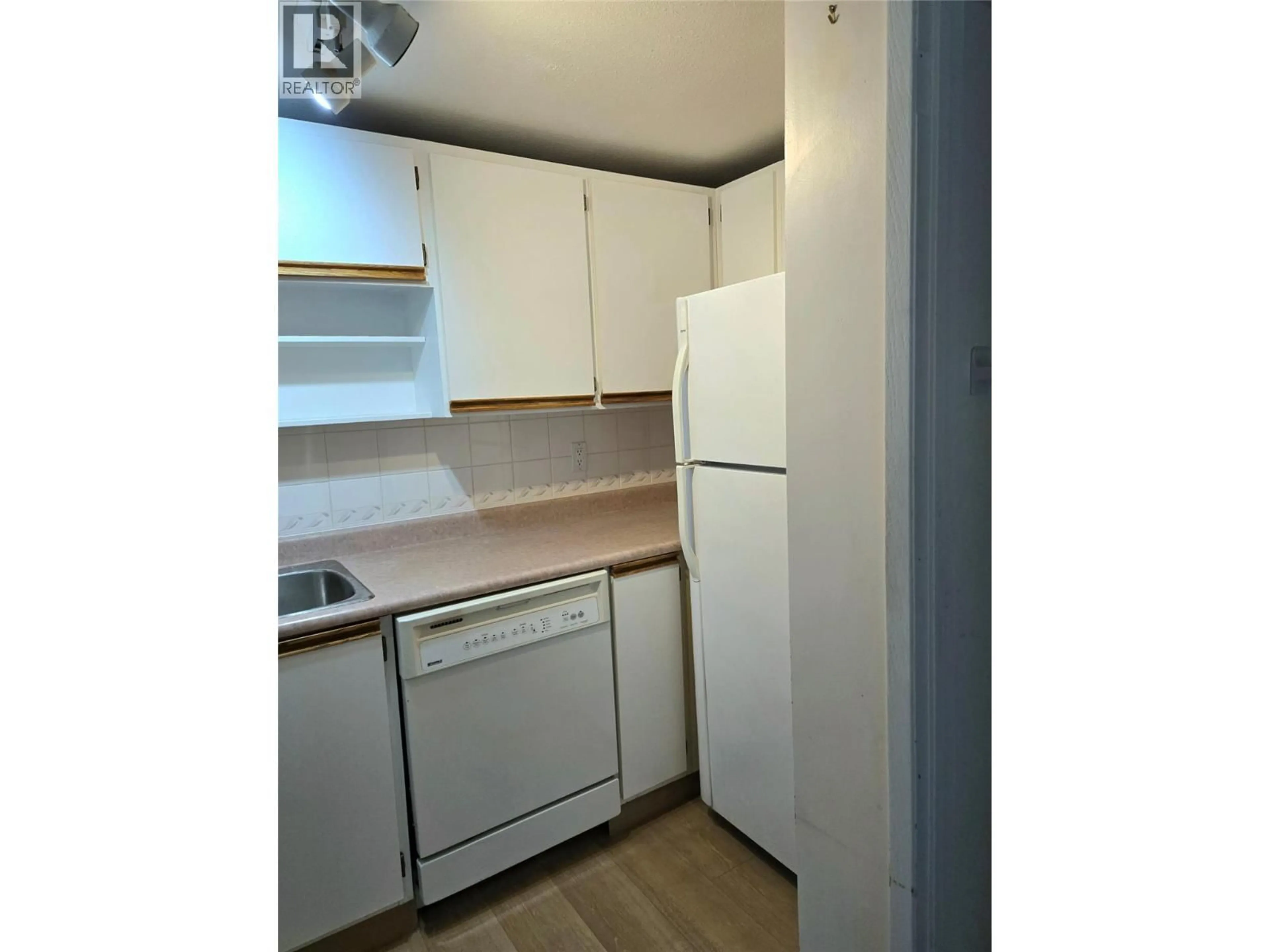 Standard kitchen, wood/laminate floor for 4 - 1471 INKAR ROAD, Kelowna British Columbia V1Y8J1