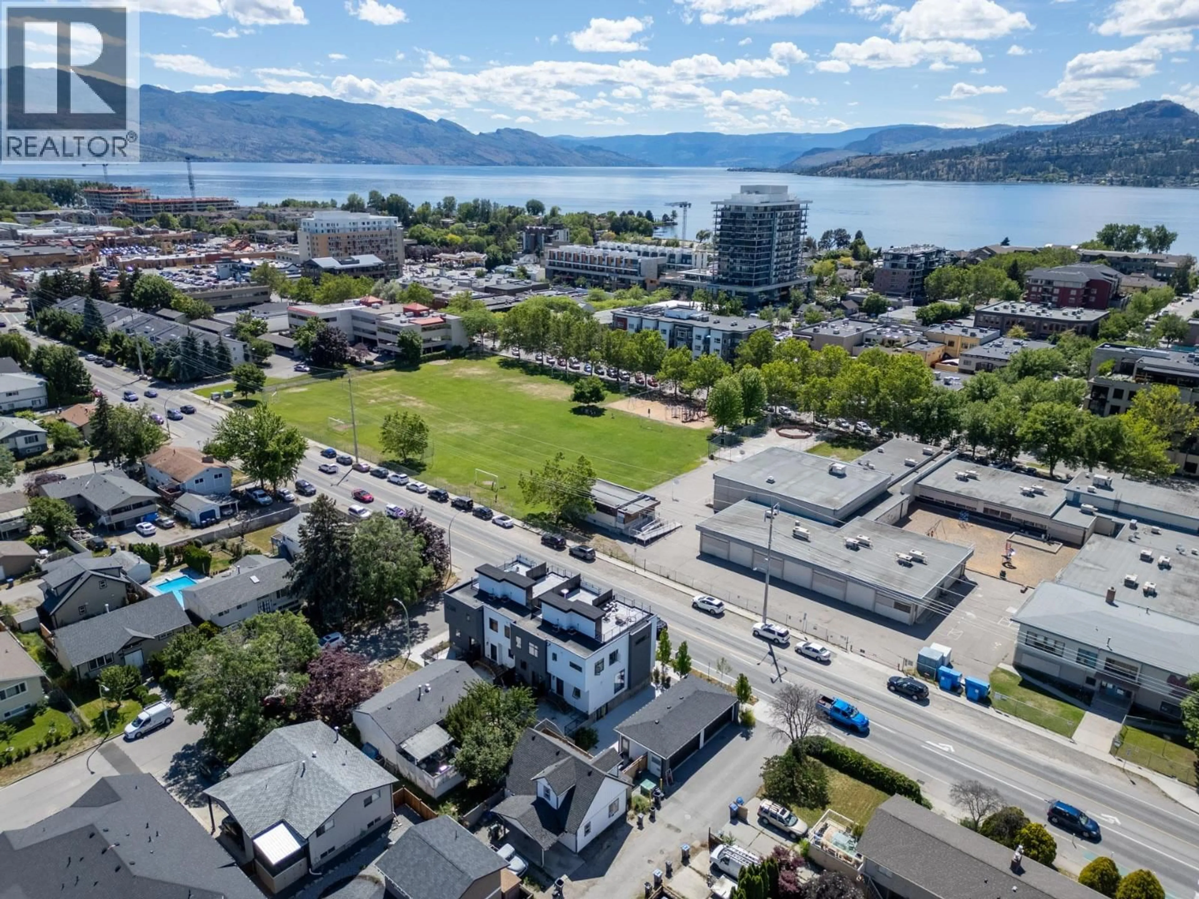 A pic from outside/outdoor area/front of a property/back of a property/a pic from drone, water/lake/river/ocean view for 3 - 2825 RICHTER STREET, Kelowna British Columbia V1Y2R6