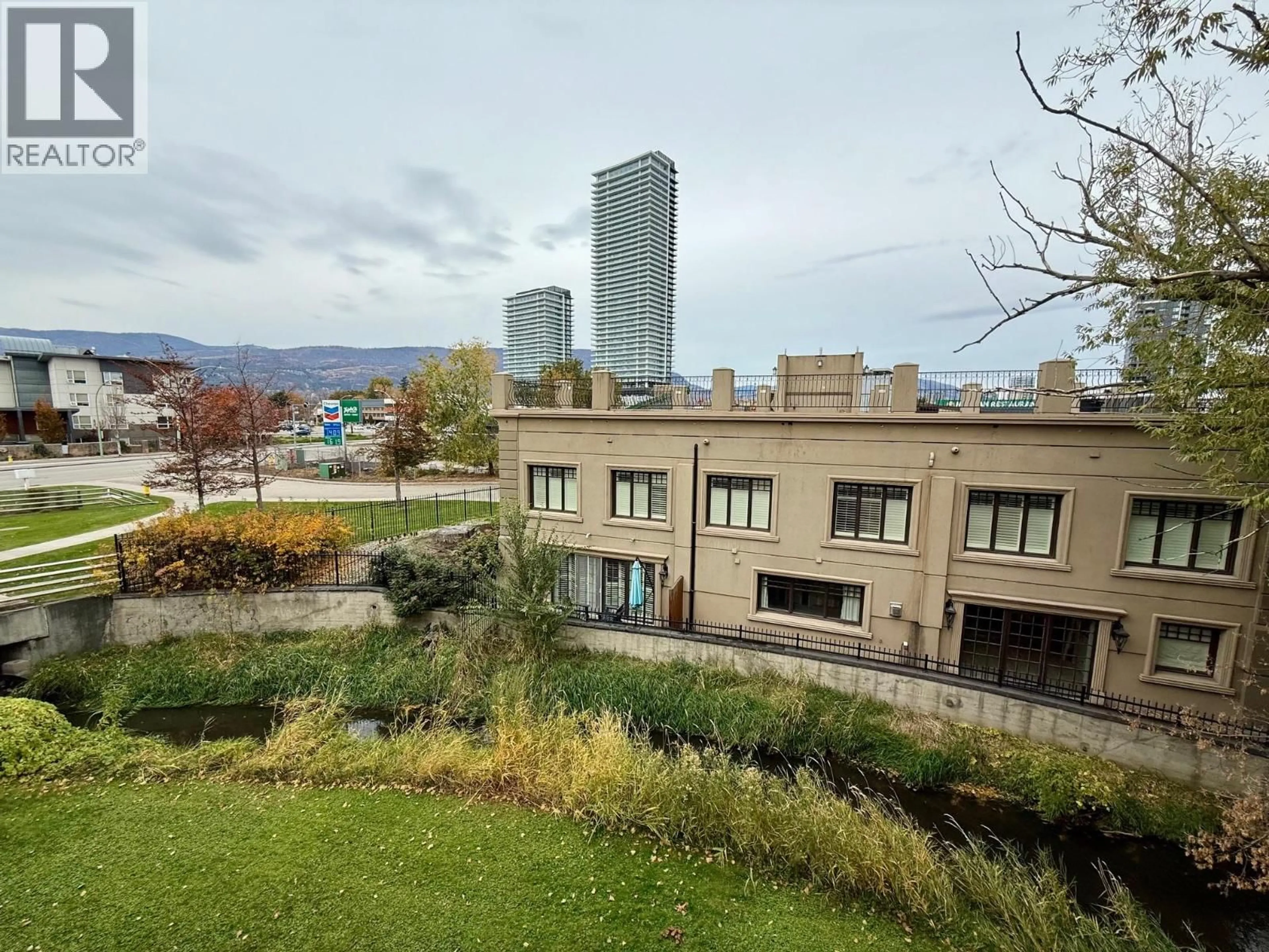 A pic from outside/outdoor area/front of a property/back of a property/a pic from drone, city buildings view from balcony for 303 - 1761 PANDOSY STREET, Kelowna British Columbia V1Y1R2