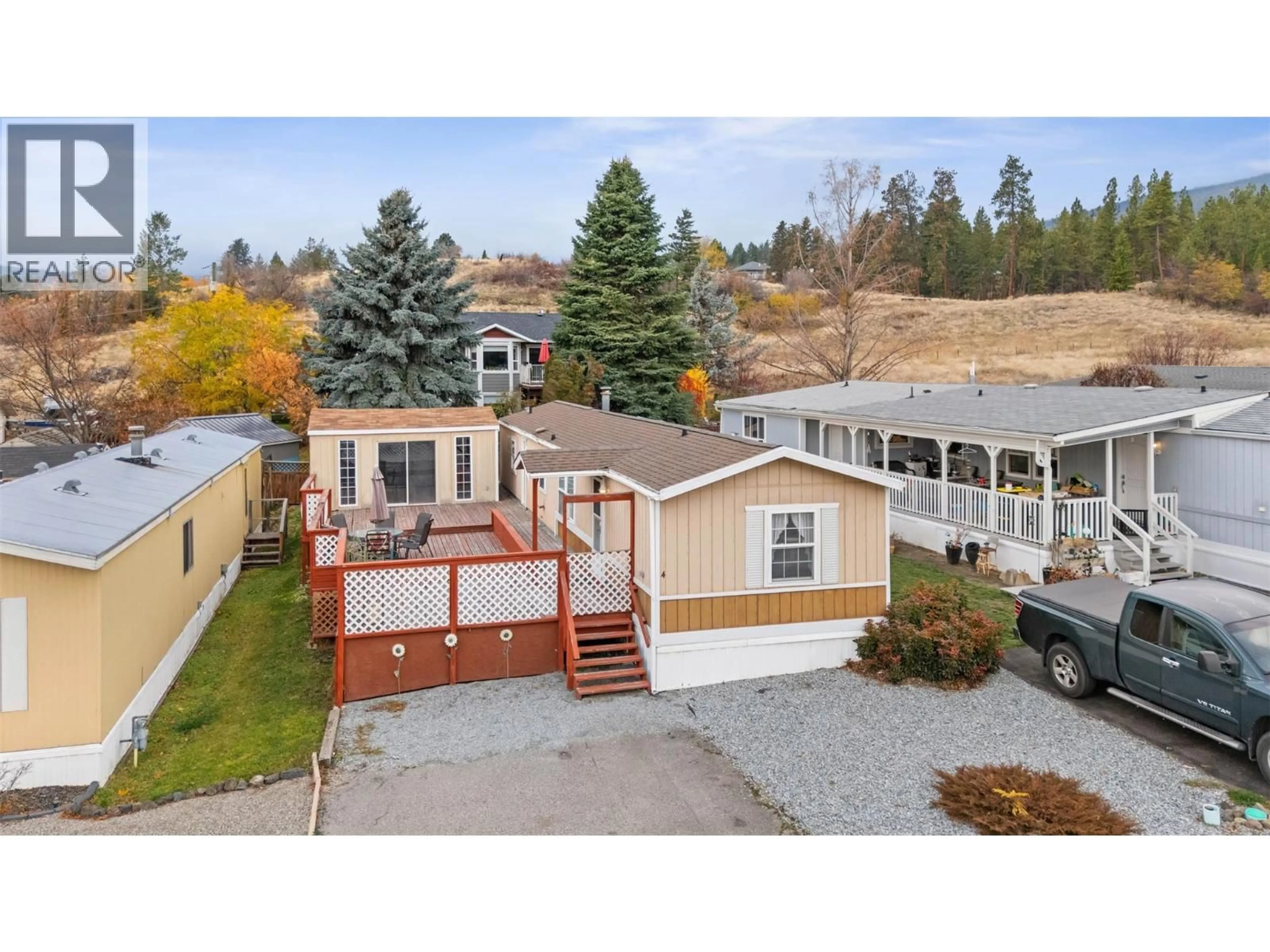 A pic from outside/outdoor area/front of a property/back of a property/a pic from drone, mountain view for 4 - 3270 SHANNON LAKE ROAD, West Kelowna British Columbia V4T2N2
