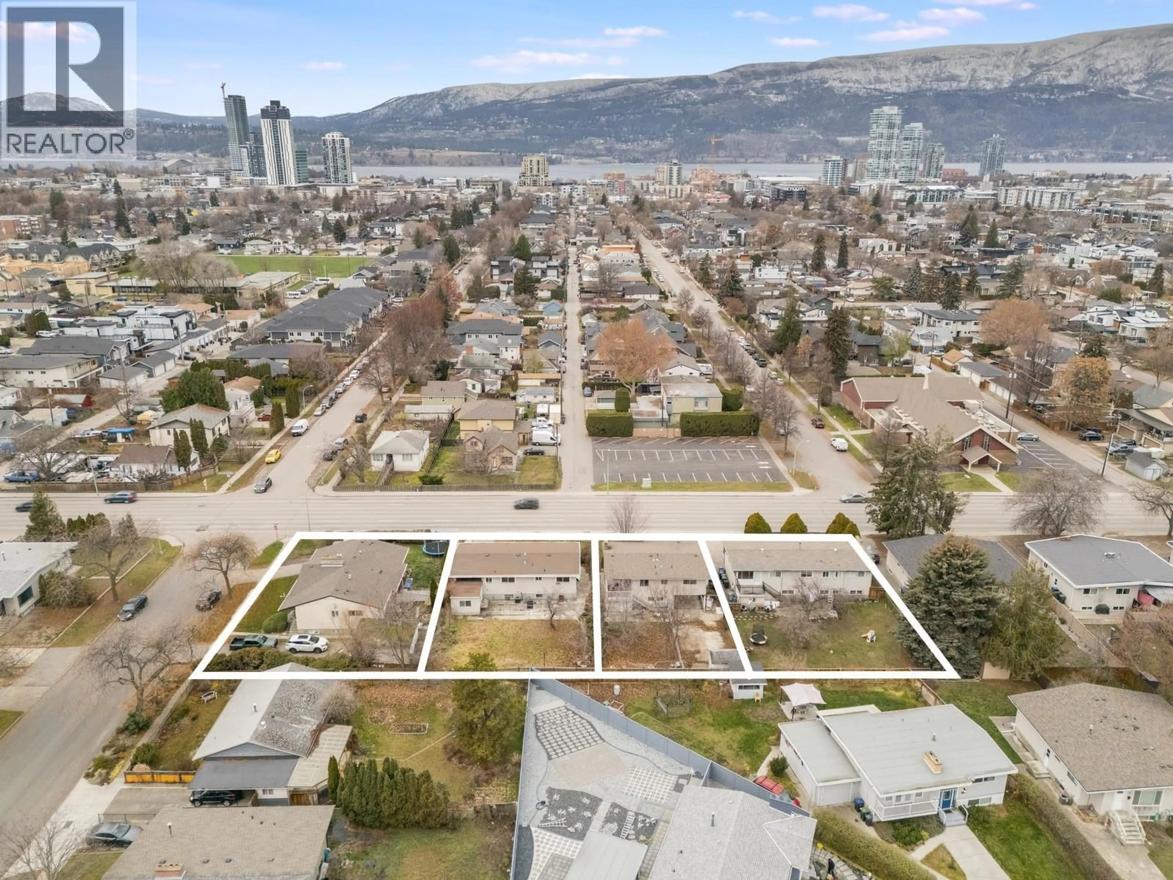 A pic from outside/outdoor area/front of a property/back of a property/a pic from drone, city buildings view from balcony for 1387 GORDON DRIVE, Kelowna British Columbia V1Y3E9
