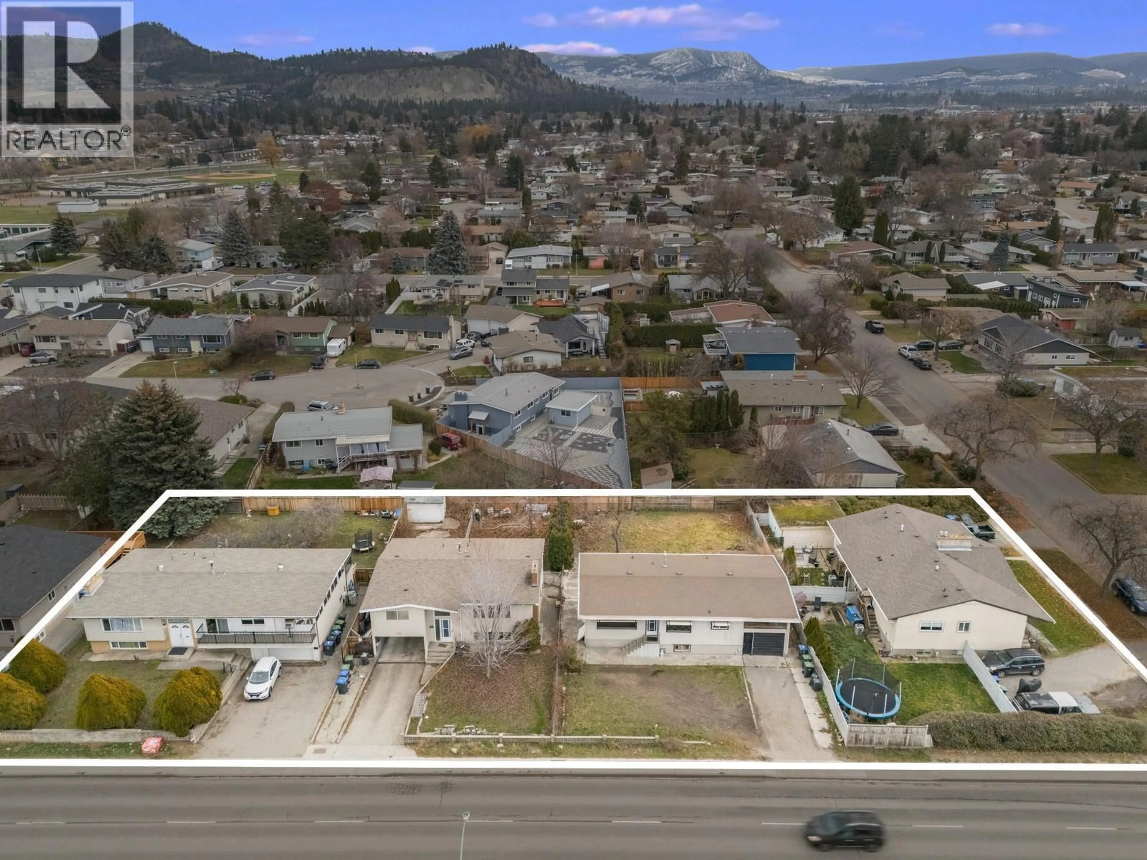 A pic from outside/outdoor area/front of a property/back of a property/a pic from drone, mountain view for 1387 GORDON DRIVE, Kelowna British Columbia V1Y3E9