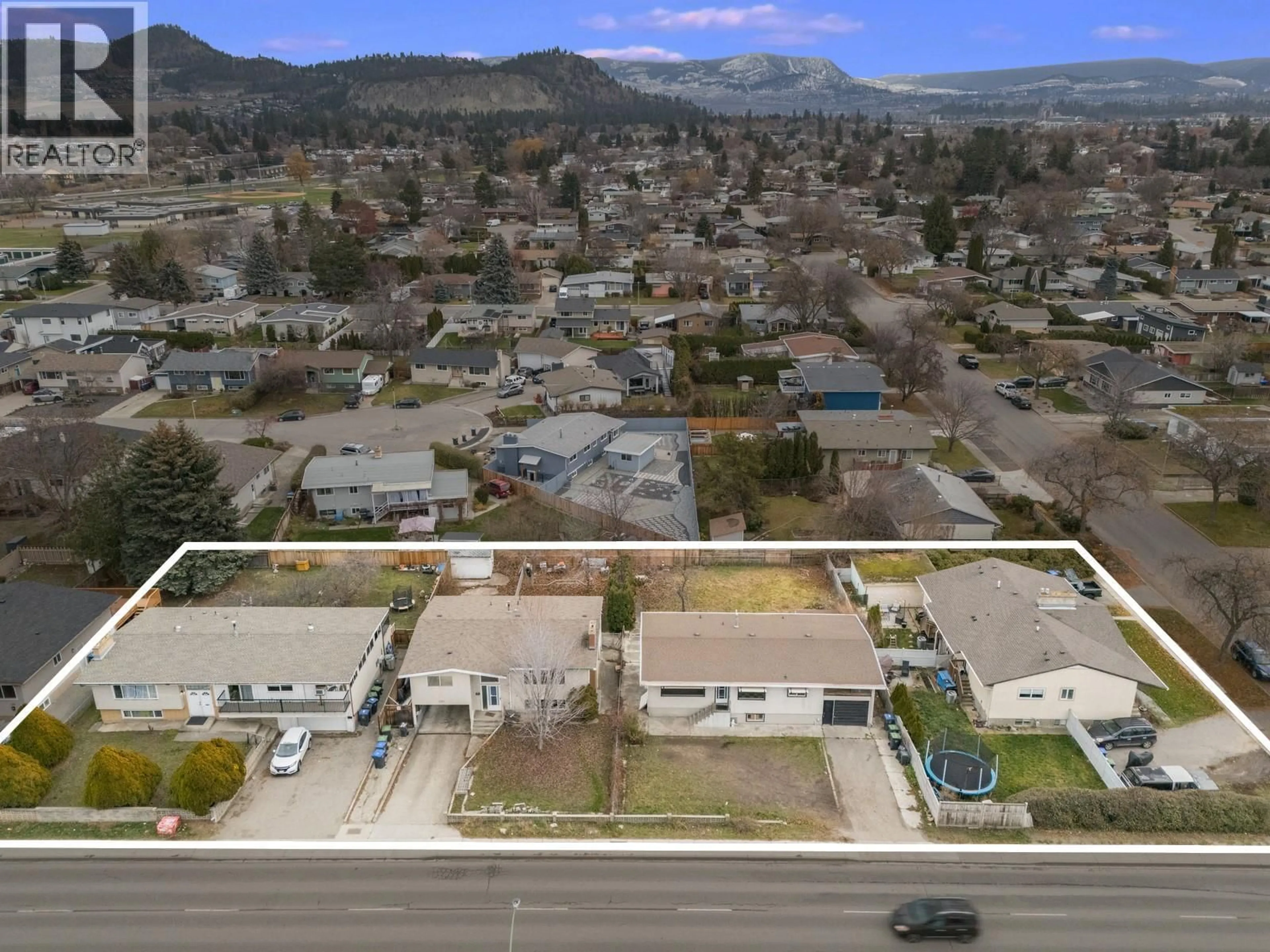 A pic from outside/outdoor area/front of a property/back of a property/a pic from drone, mountain view for 1395 GORDON DRIVE, Kelowna British Columbia V1Y3E9
