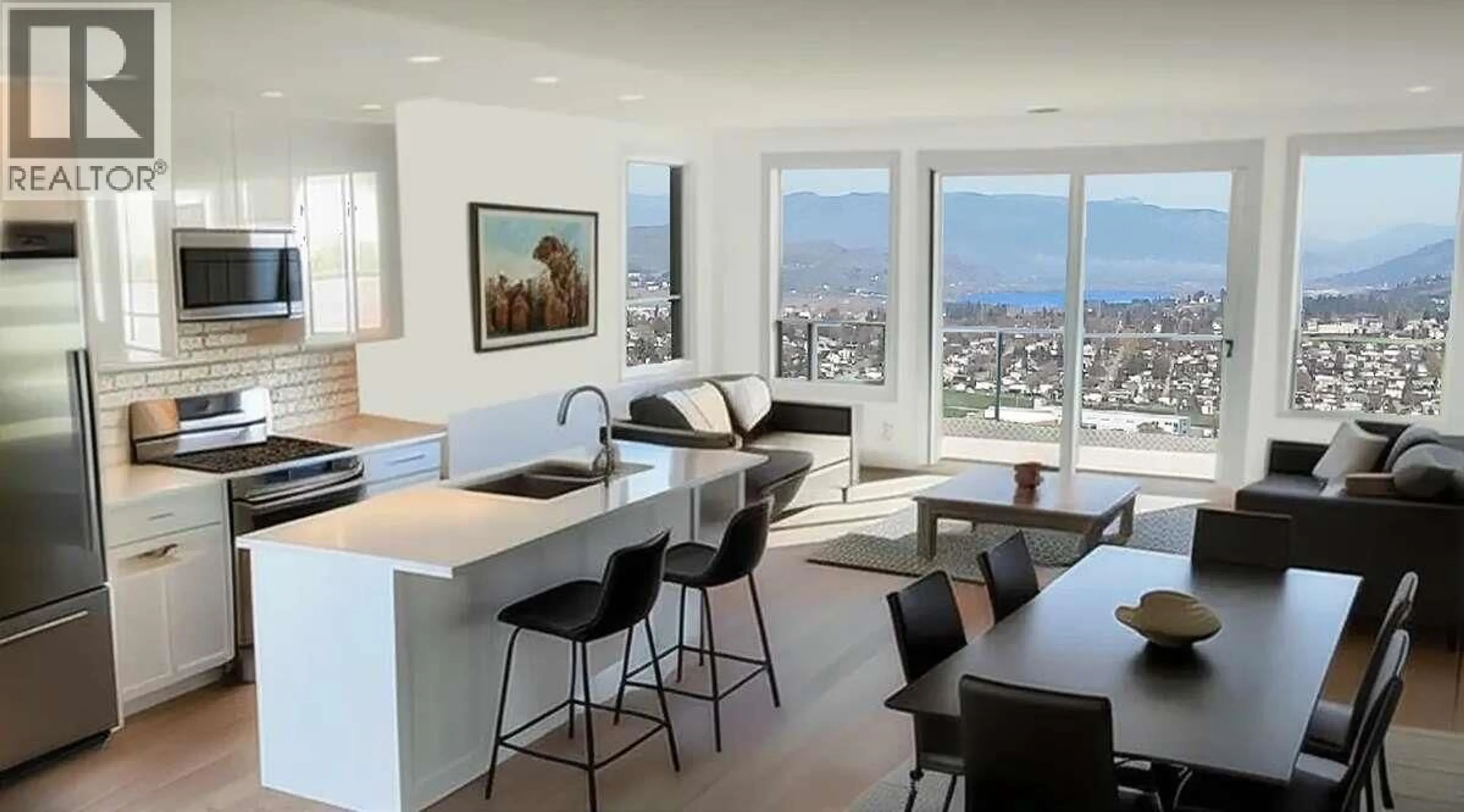 Open concept kitchen, wood/laminate floor for 2 - 1050 MT REVELSTOKE PLACE, Vernon British Columbia V1B3Z9