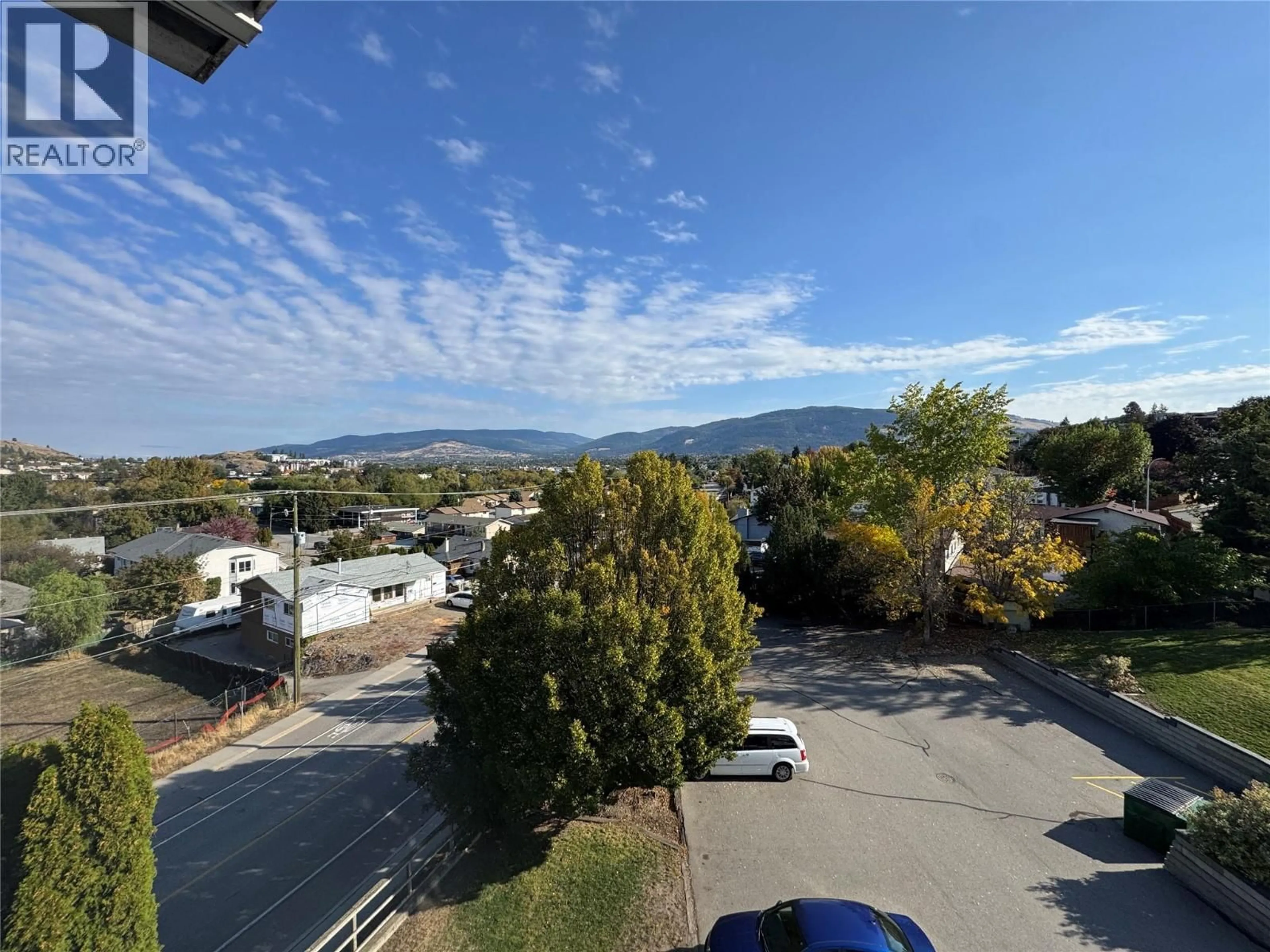 A pic from outside/outdoor area/front of a property/back of a property/a pic from drone, mountain view for 309 - 3929 22 AVENUE, Vernon British Columbia V1T7M7