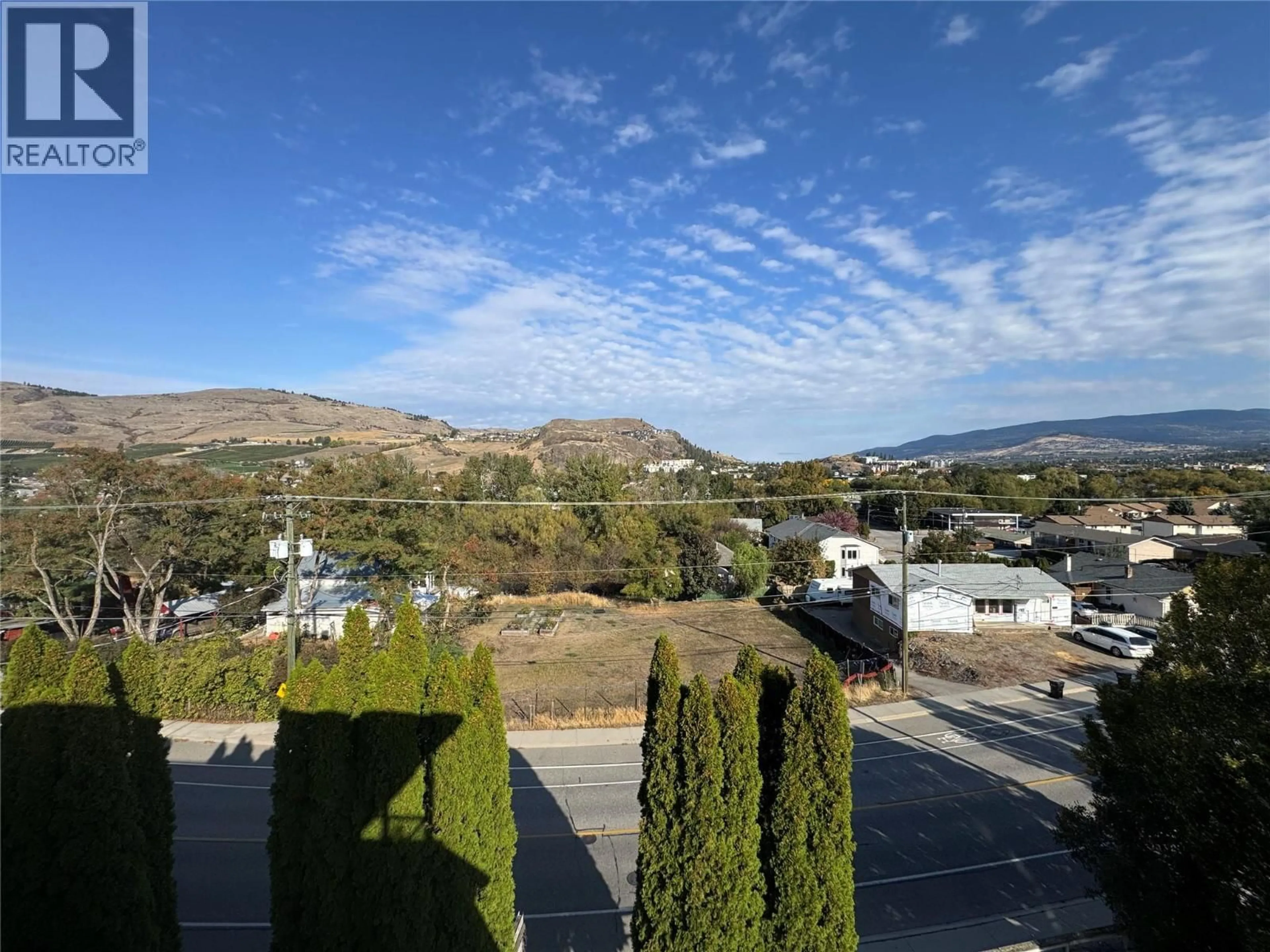 A pic from outside/outdoor area/front of a property/back of a property/a pic from drone, mountain view for 309 - 3929 22 AVENUE, Vernon British Columbia V1T7M7