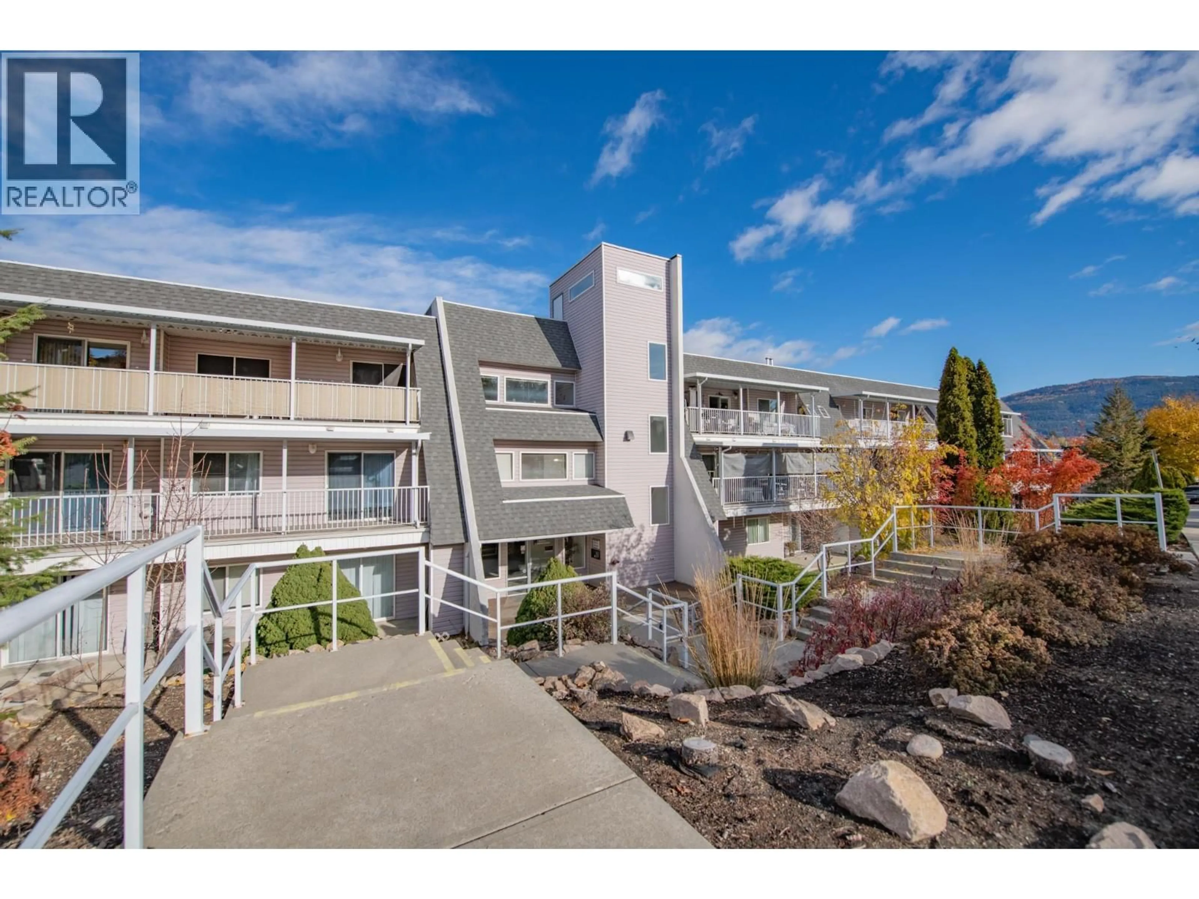 A pic from outside/outdoor area/front of a property/back of a property/a pic from drone, mountain view for 309 - 3929 22 AVENUE, Vernon British Columbia V1T7M7
