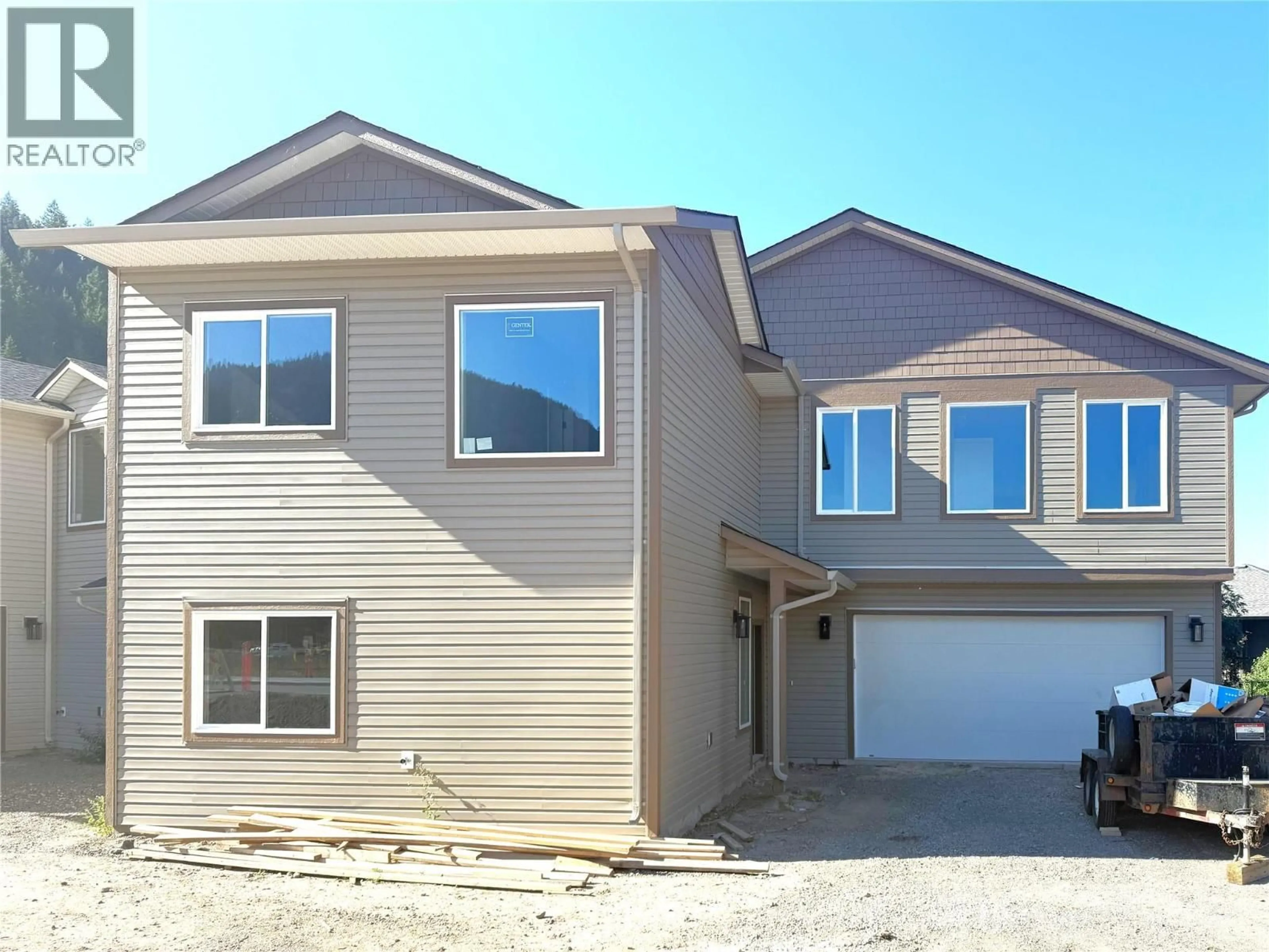 Home with vinyl exterior material, street for 300 BROOKE DRIVE, Chase British Columbia V0E1M0