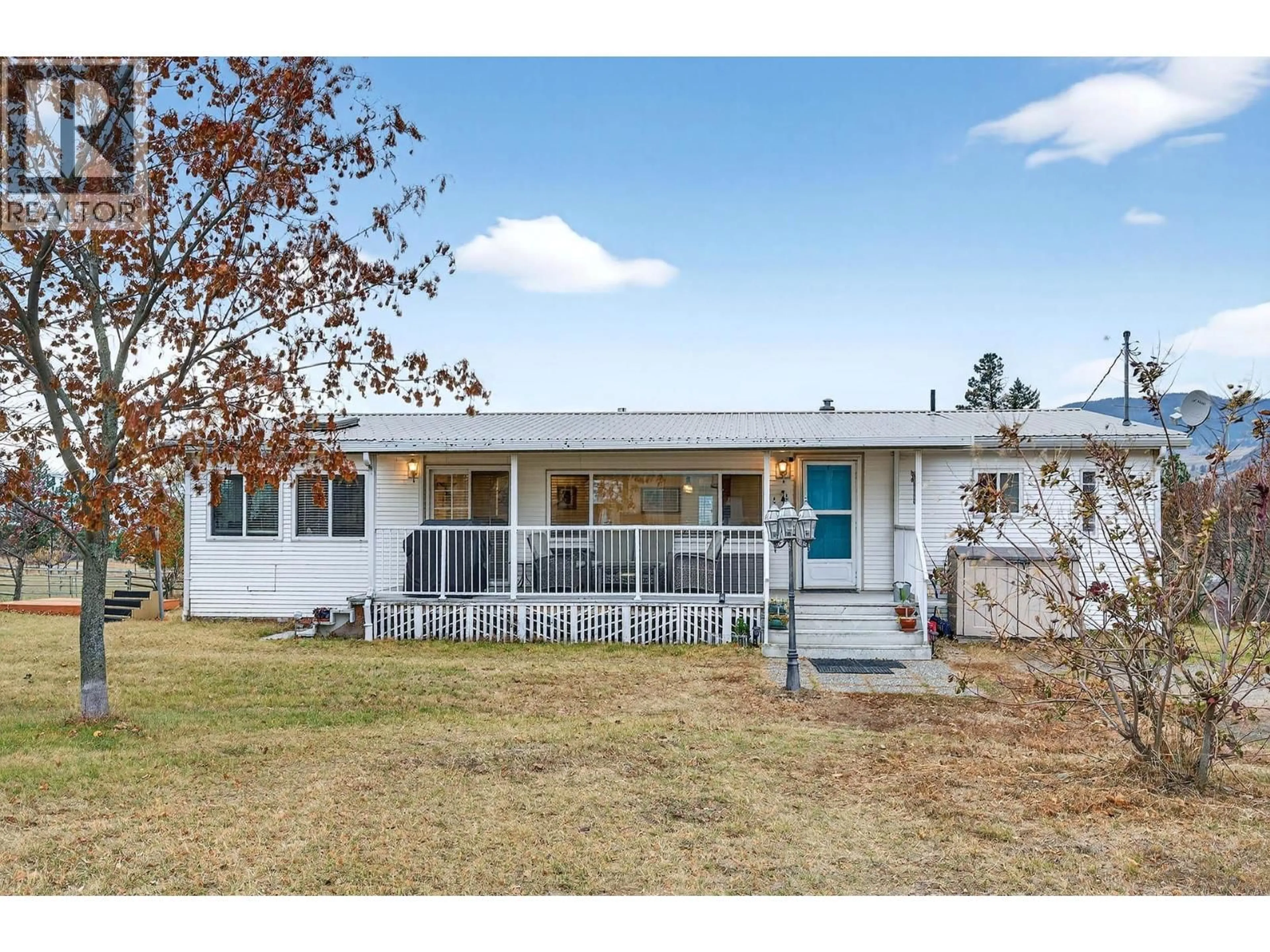 Home with vinyl exterior material, street for 1528 LAVEAU ROAD, Kamloops British Columbia V0E2P0