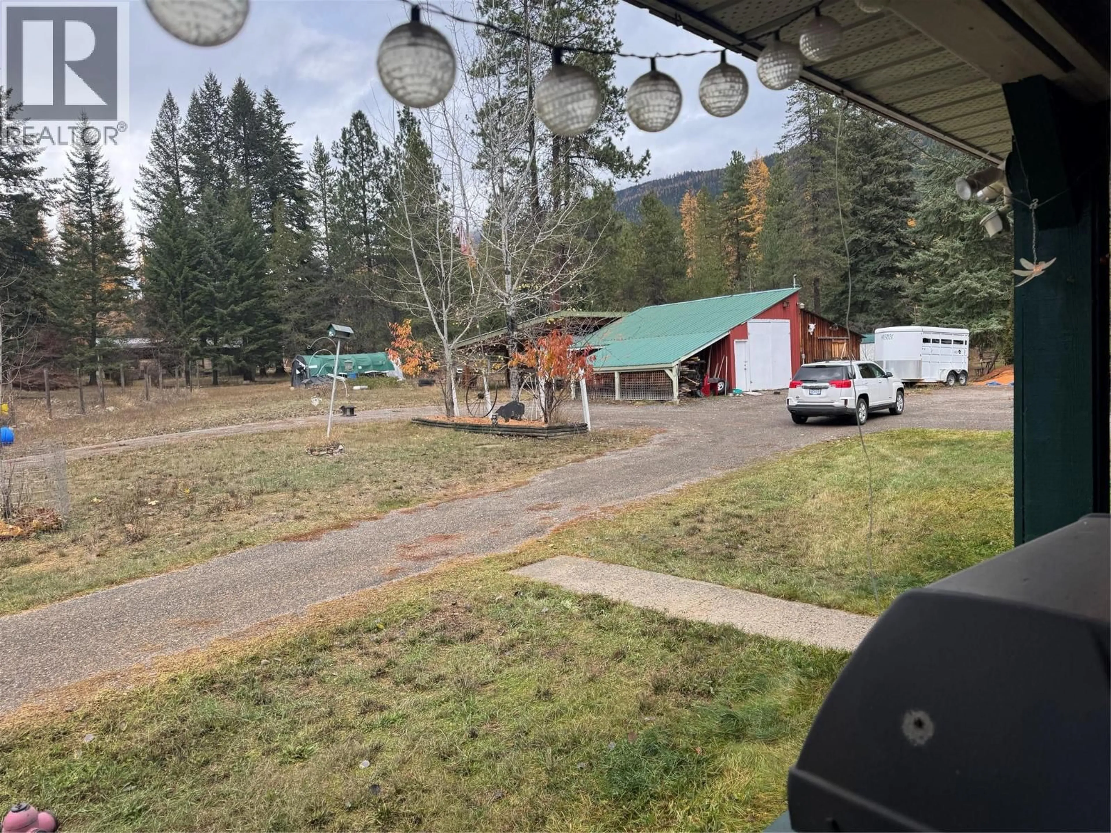A pic from outside/outdoor area/front of a property/back of a property/a pic from drone, mountain view for 1368 WENGER ROAD, Arrow Creek British Columbia V0B1G9