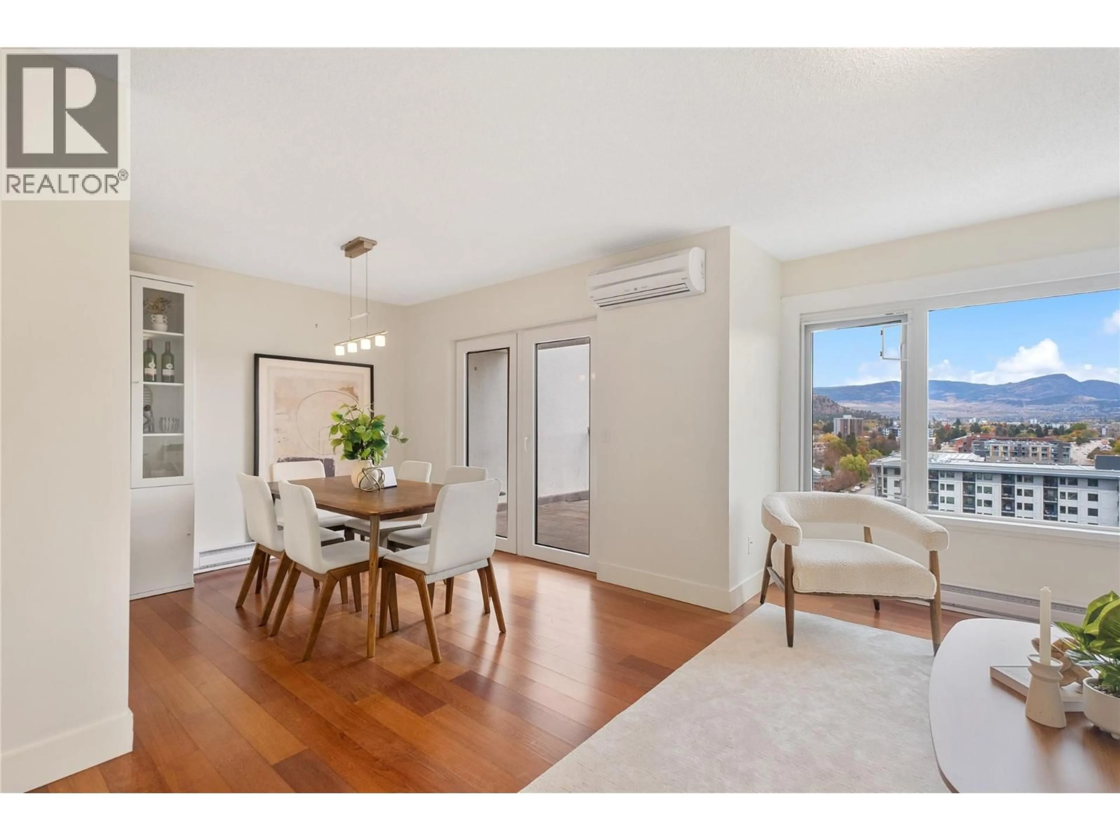 Dining room, wood/laminate floor for 1206 - 737 LEON AVENUE, Kelowna British Columbia V1Y8L6