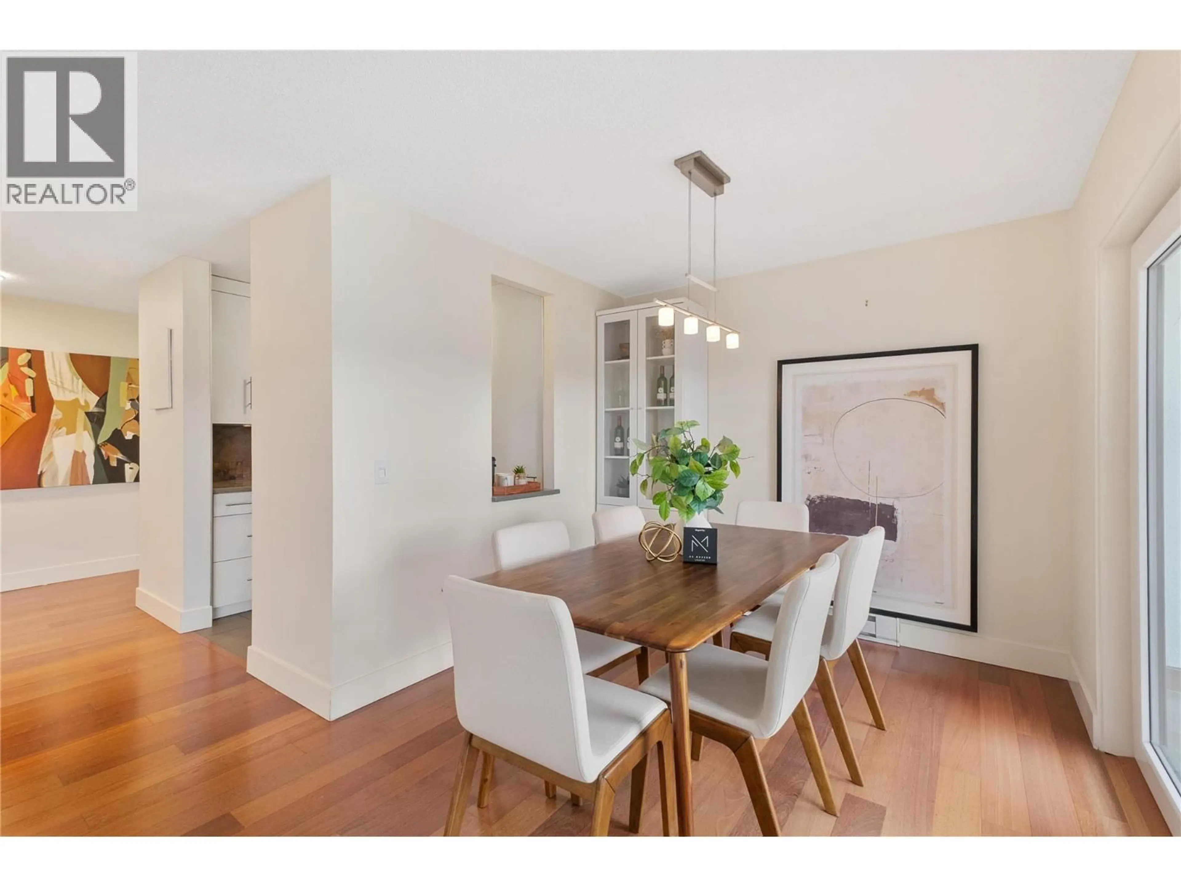 Dining room, wood/laminate floor for 1206 - 737 LEON AVENUE, Kelowna British Columbia V1Y8L6