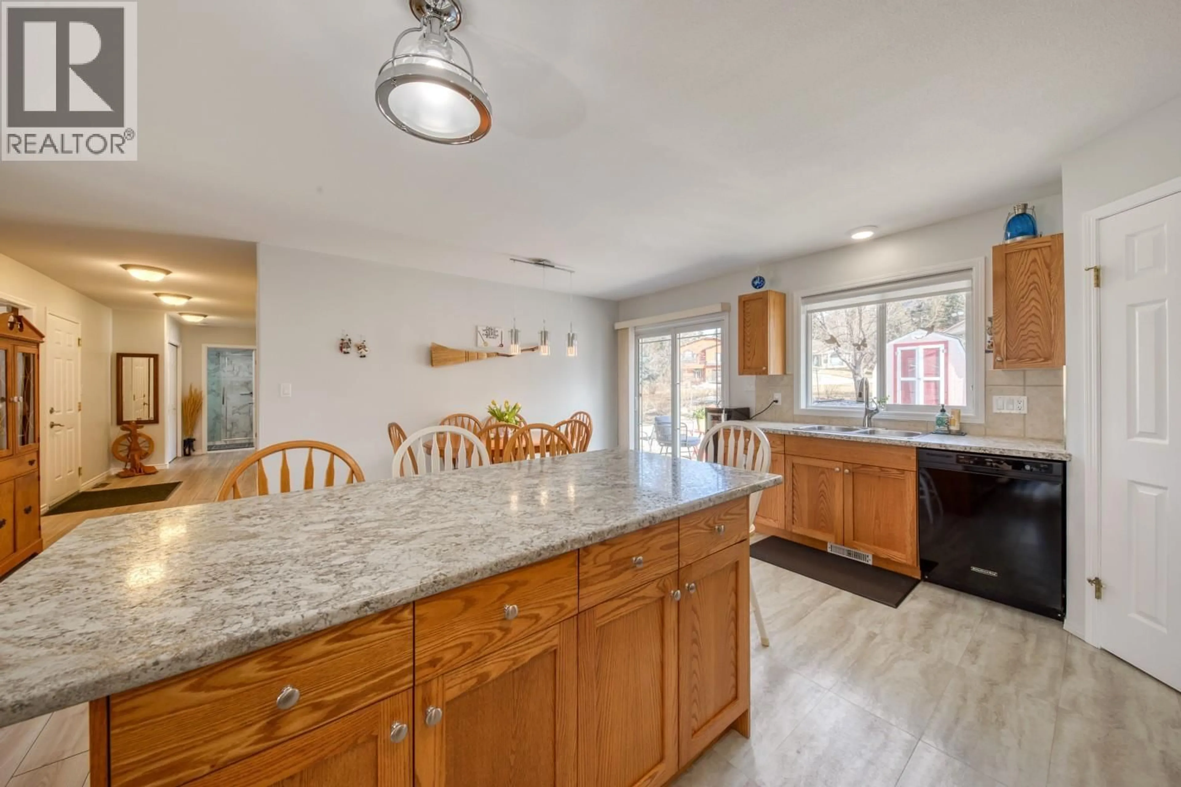 Open concept kitchen, ceramic/tile floor for 4887 GLEN EAGLE DRIVE, Fairmont Hot Springs British Columbia V0B1L1