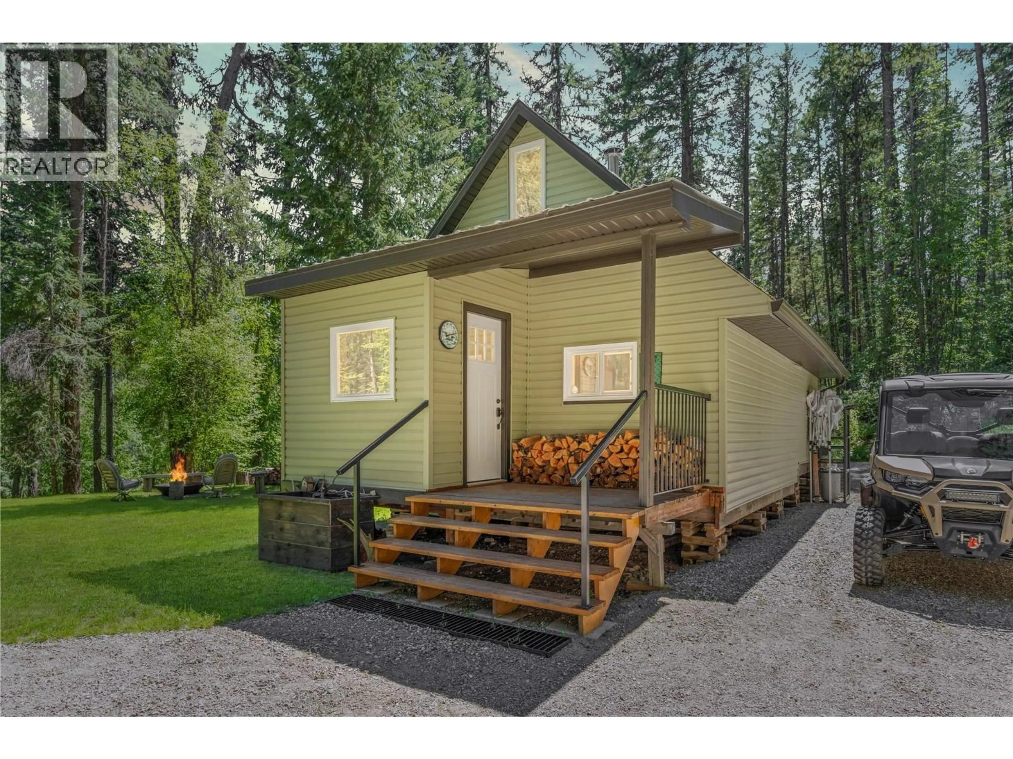 Home with vinyl exterior material, street for 5950 CROUSE CREEK FOREST, Westbridge British Columbia V0H2B0