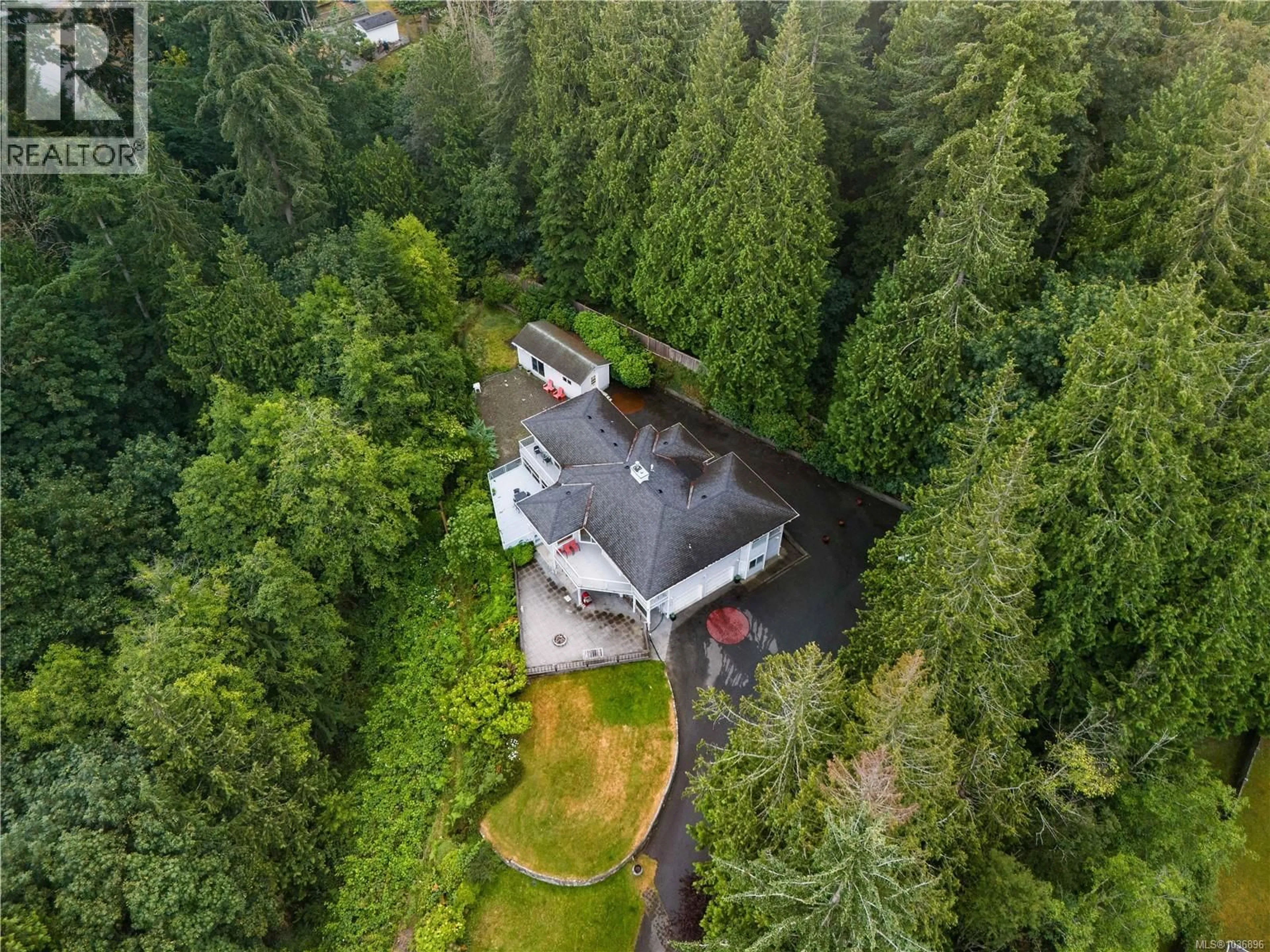 A pic from outside/outdoor area/front of a property/back of a property/a pic from drone, forest/trees view for 5650 ALDER WAY, Nanaimo British Columbia V9T5N4