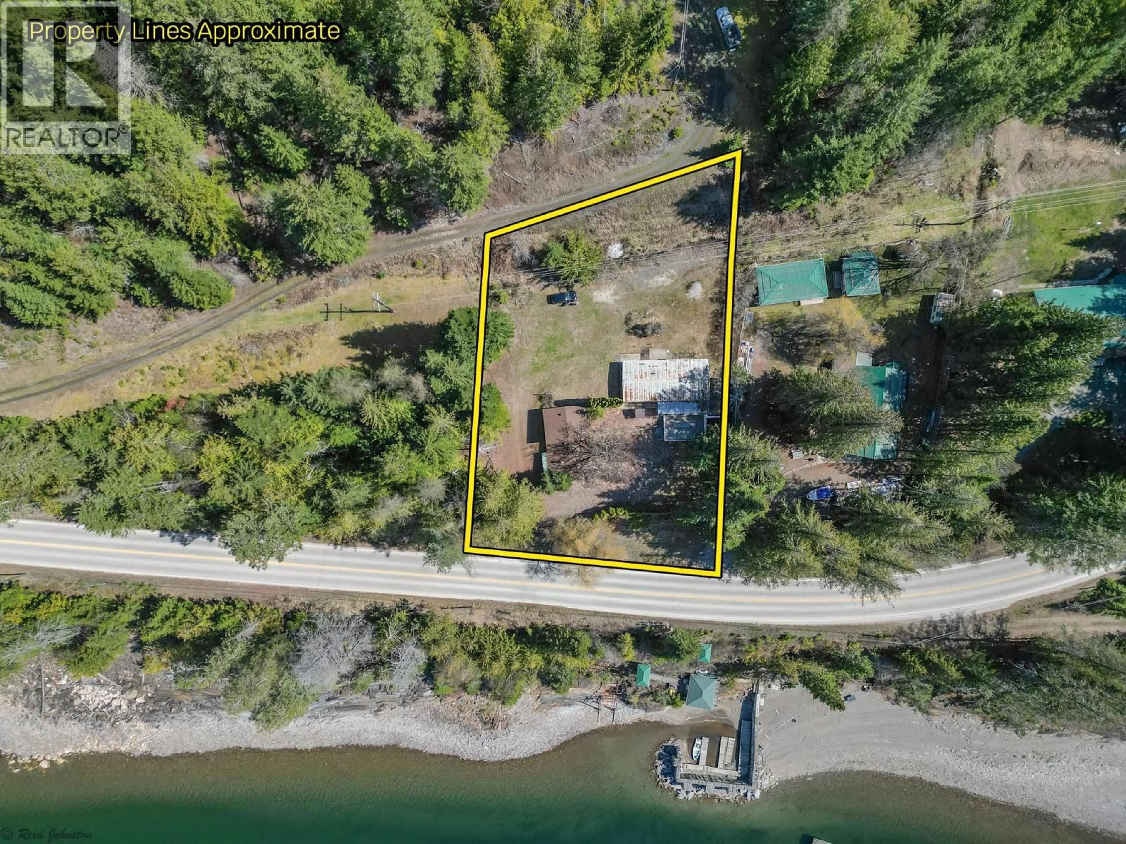 A pic from outside/outdoor area/front of a property/back of a property/a pic from drone, water/lake/river/ocean view for 12830 3A HIGHWAY, Boswell British Columbia V0B1A4