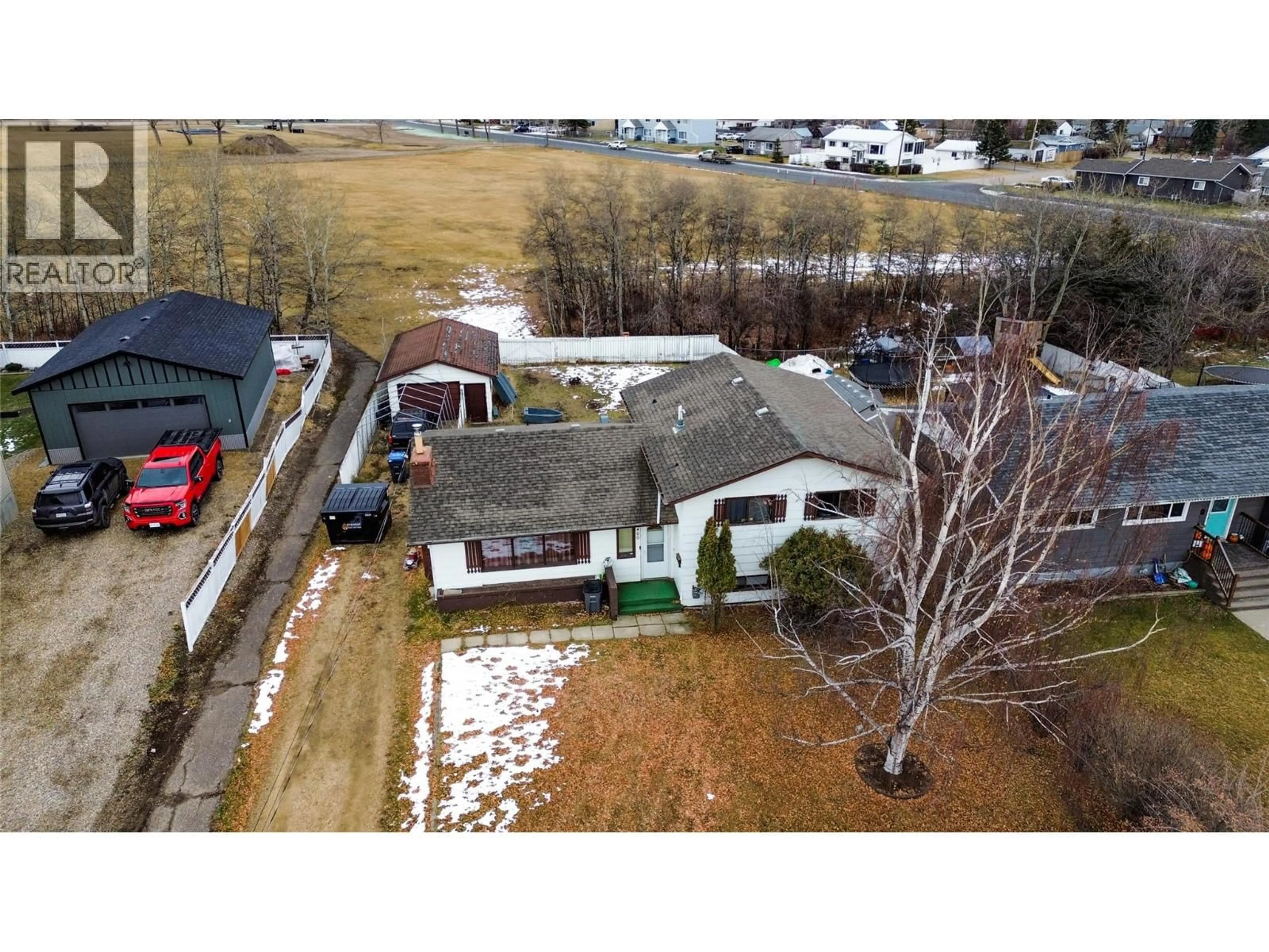 A pic from outside/outdoor area/front of a property/back of a property/a pic from drone, street for 9400 RAVINE DRIVE, Dawson Creek British Columbia V1G3V6