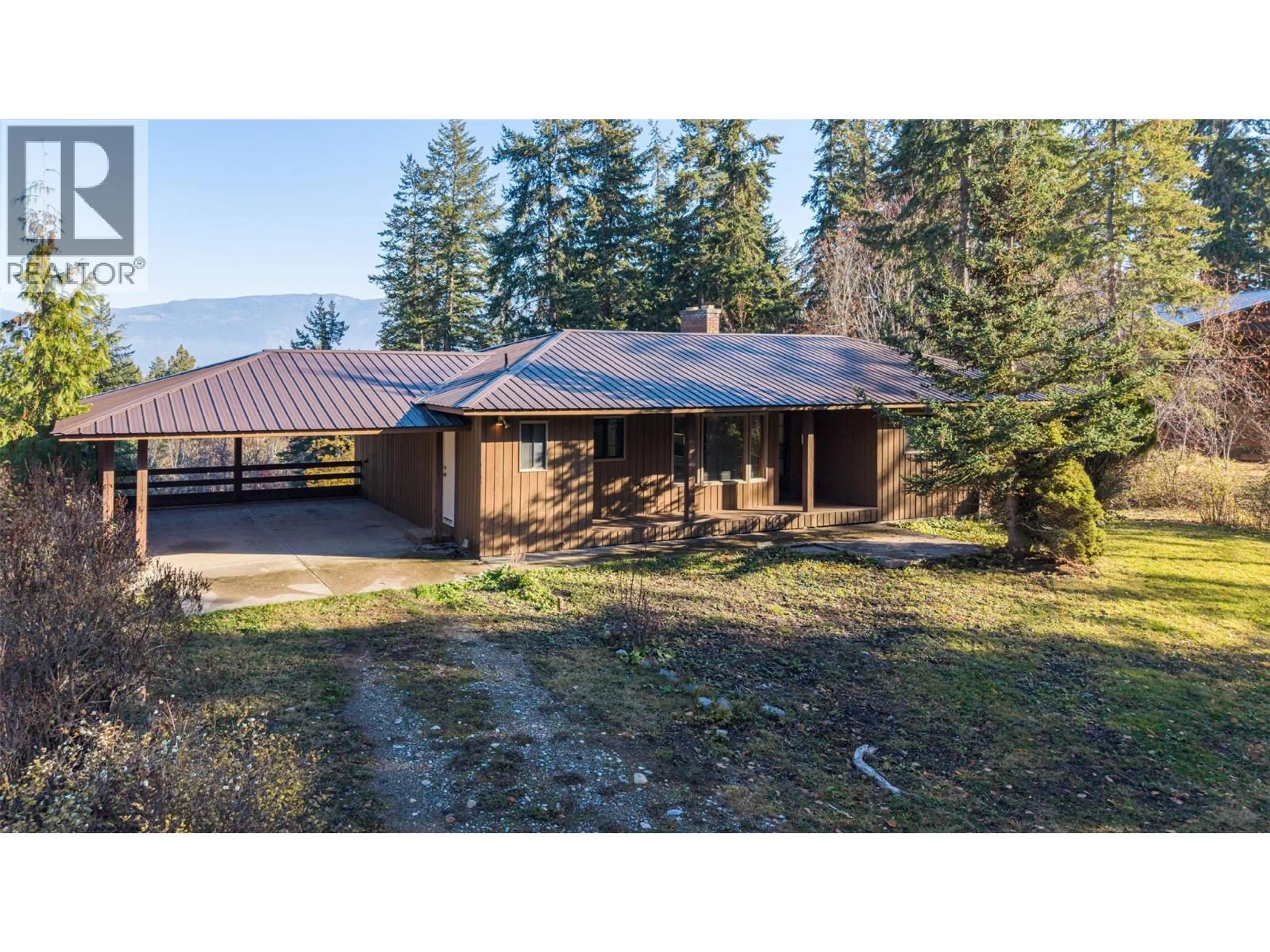 A pic from outside/outdoor area/front of a property/back of a property/a pic from drone, unknown for 4358 CHAMBERLAIN ROAD, Spallumcheen British Columbia V4Y0M1