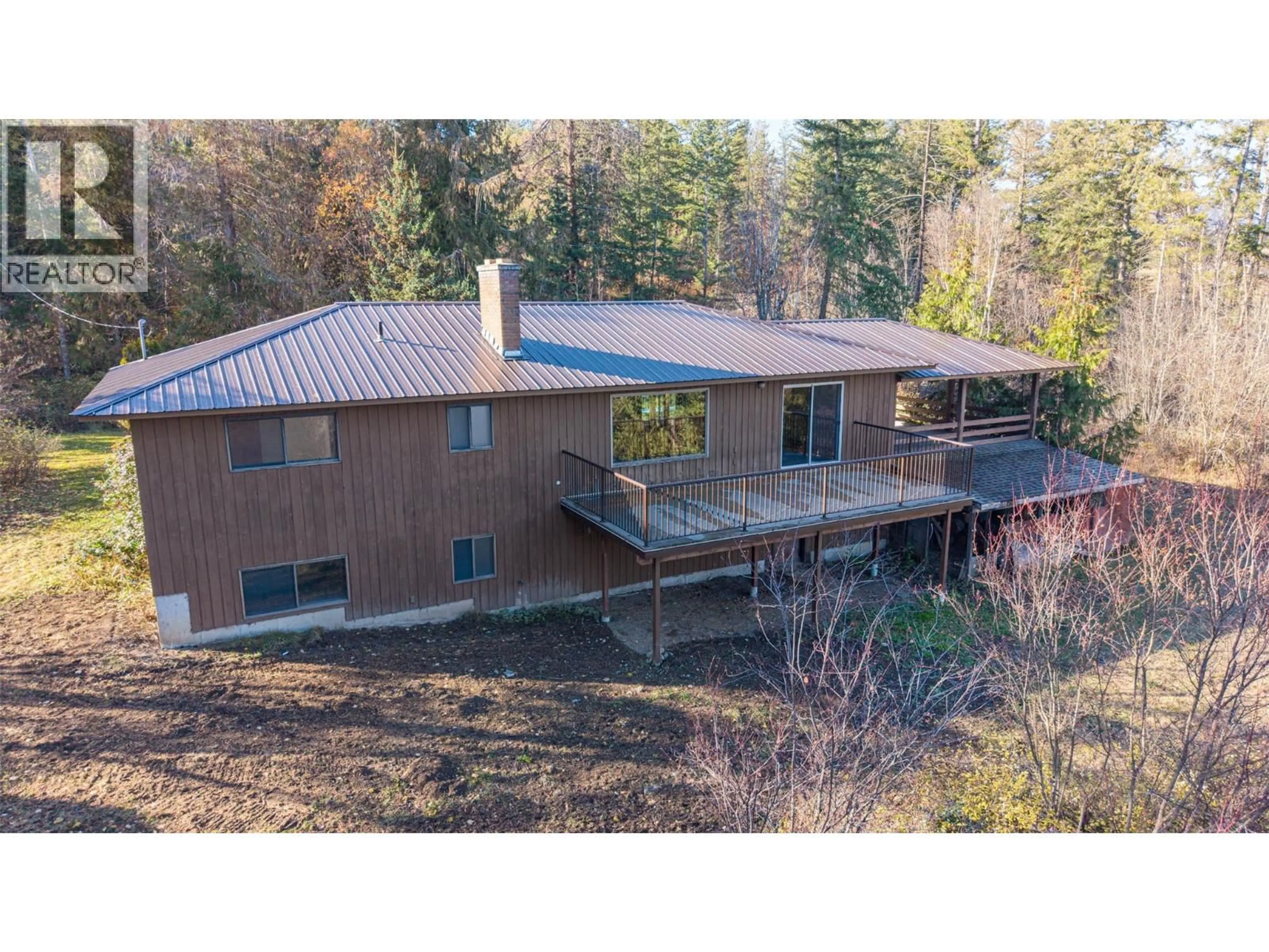 A pic from outside/outdoor area/front of a property/back of a property/a pic from drone, unknown for 4358 CHAMBERLAIN ROAD, Spallumcheen British Columbia V4Y0M1