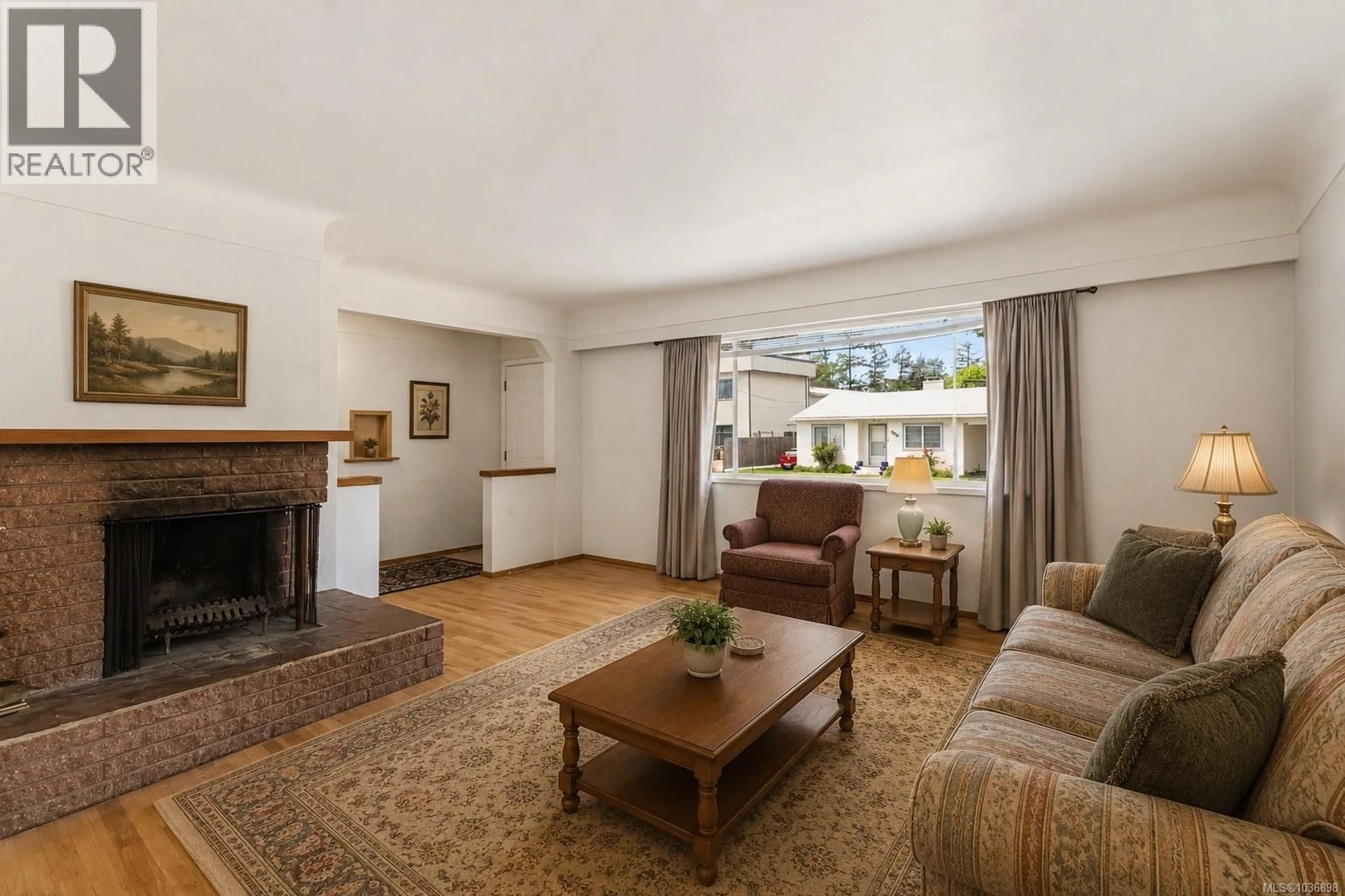 Living room with furniture, unknown for 993 MCCALLUM ROAD, Langford British Columbia V9B4C7