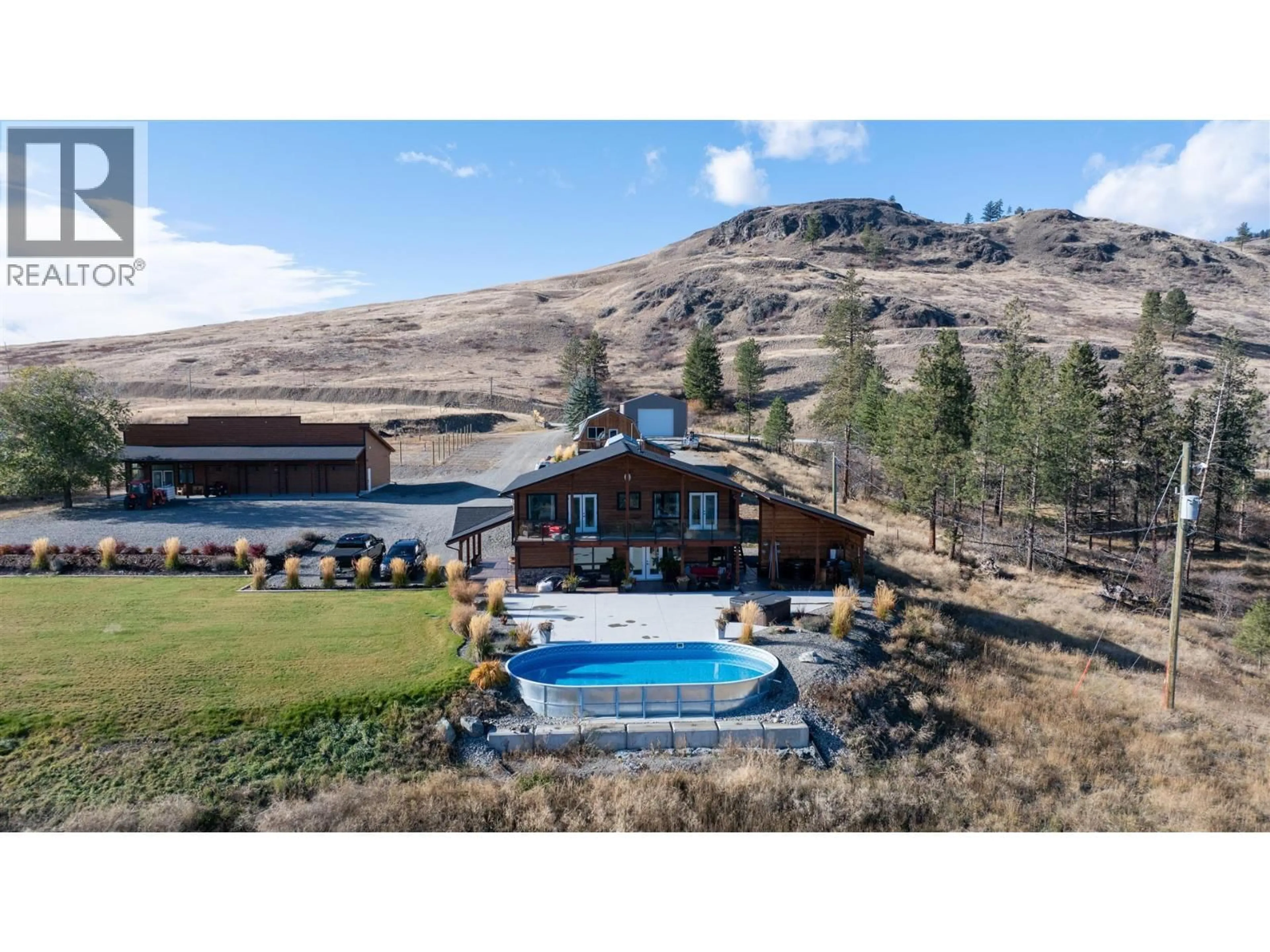 A pic from outside/outdoor area/front of a property/back of a property/a pic from drone, mountain view for 4520 HIGHWAY 3 OTHER, Rock Creek British Columbia V0H1Y0