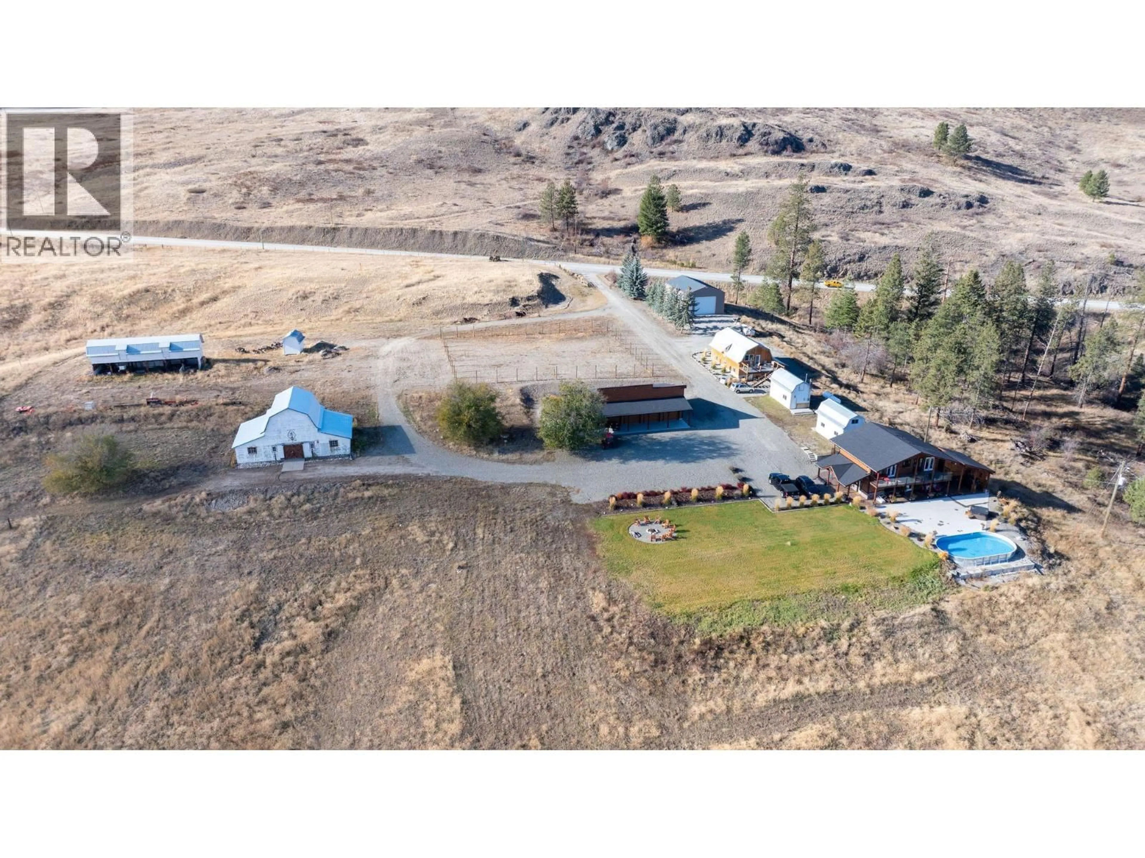 A pic from outside/outdoor area/front of a property/back of a property/a pic from drone, mountain view for 4520 HIGHWAY 3 OTHER, Rock Creek British Columbia V0H1Y0