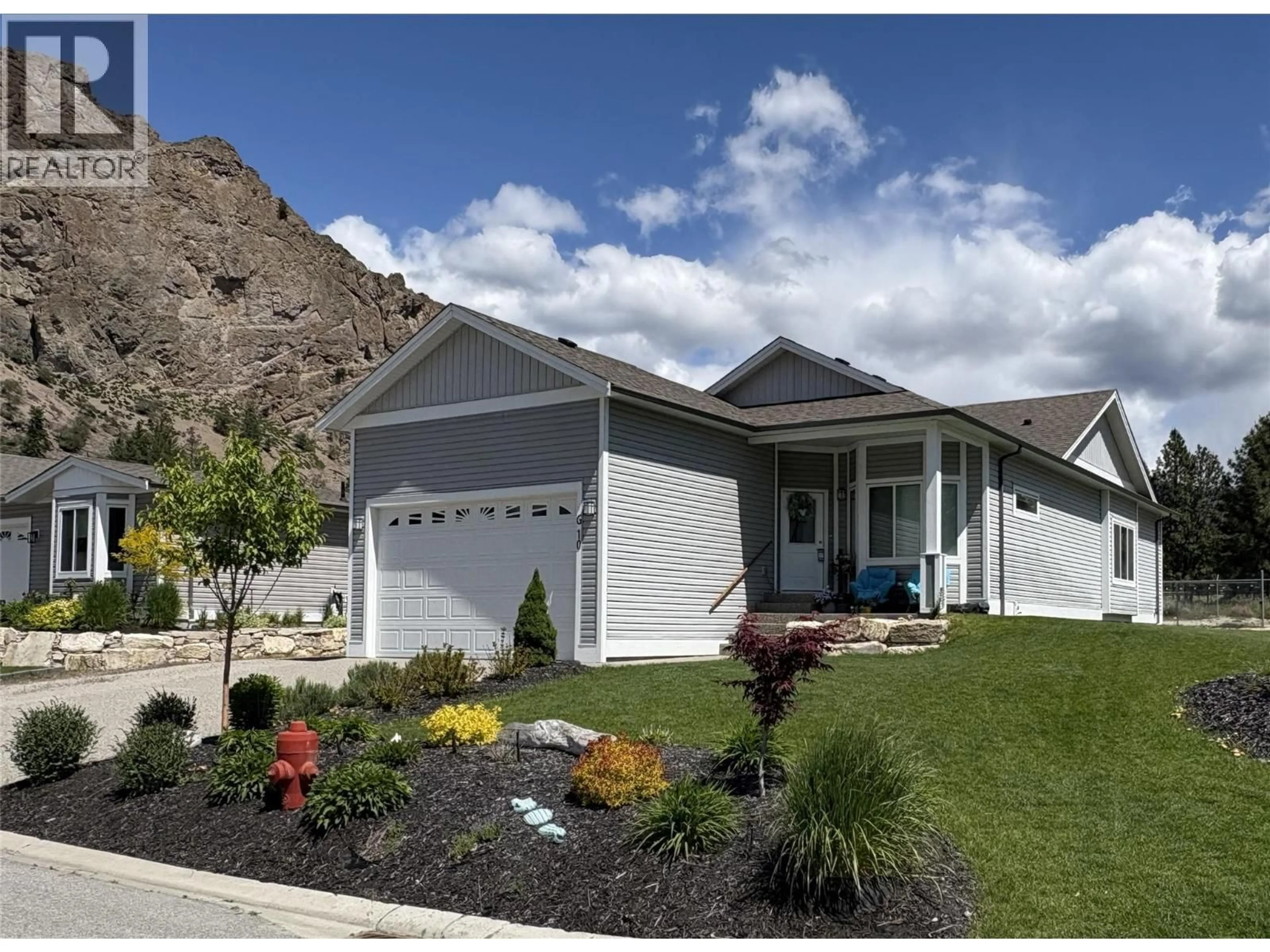 Home with vinyl exterior material, mountain view for G10 - 4505 MCLEAN CREEK ROAD, Okanagan Falls British Columbia V0H1R1
