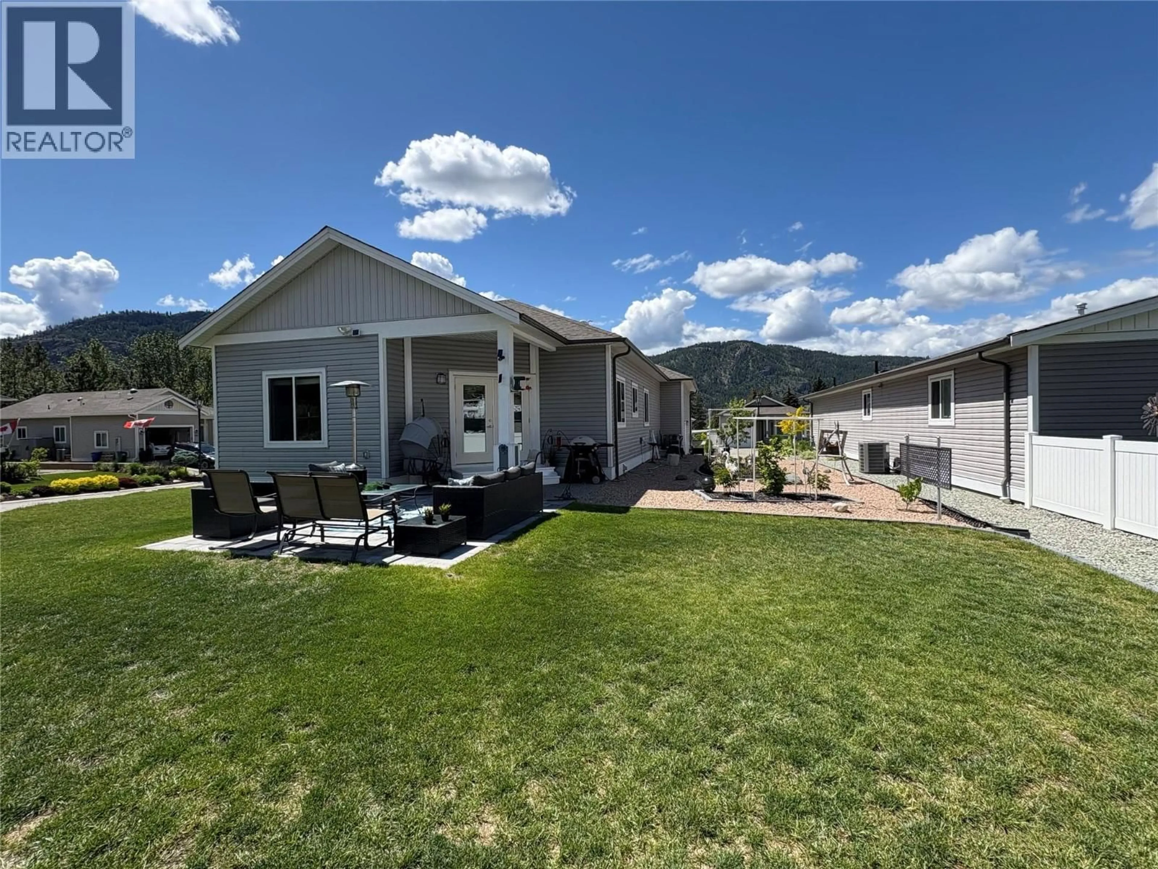 Home with vinyl exterior material, mountain view for G10 - 4505 MCLEAN CREEK ROAD, Okanagan Falls British Columbia V0H1R1