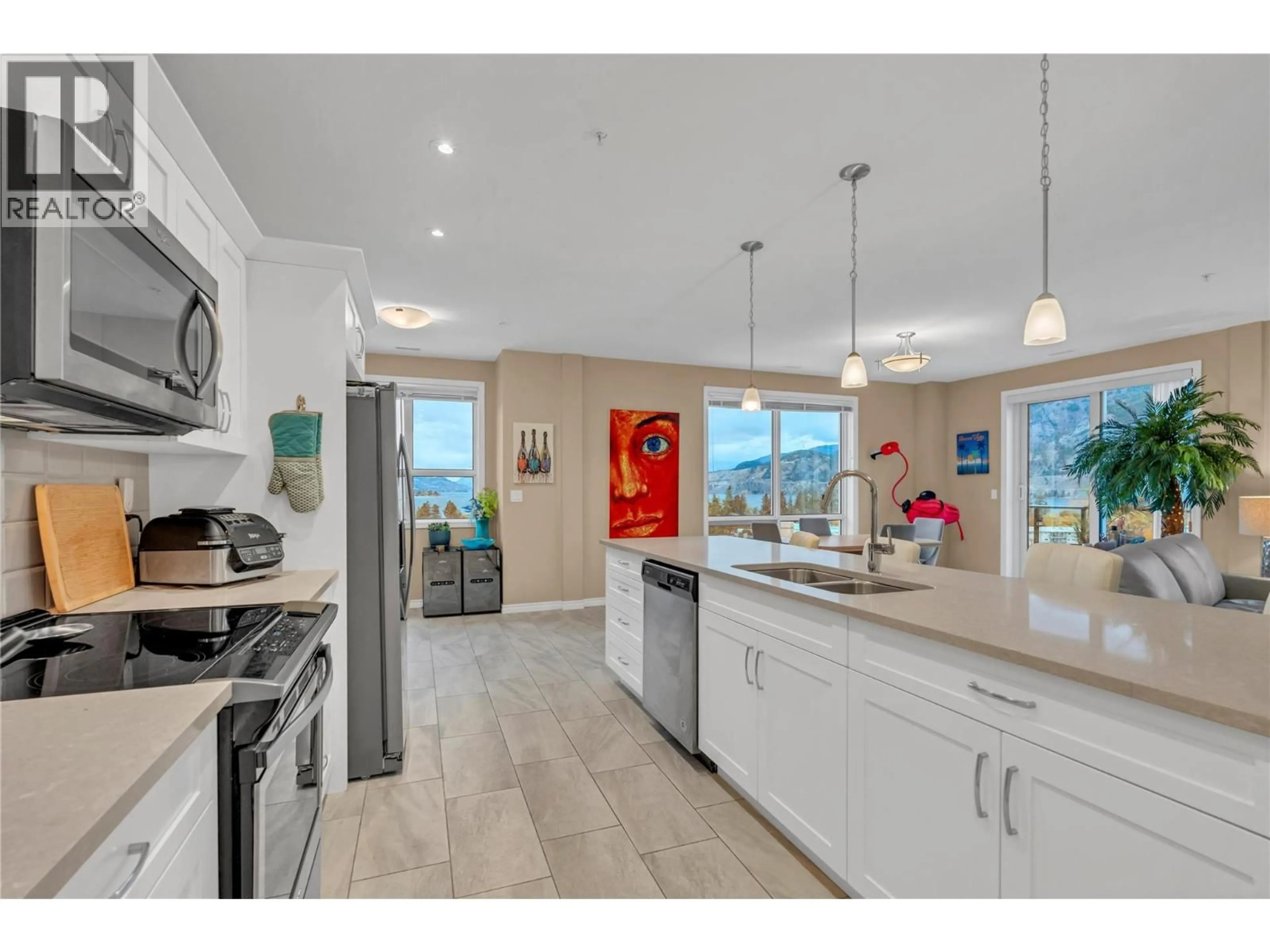 Open concept kitchen, ceramic/tile floor for 1004 - 3388 SKAHA LAKE ROAD, Penticton British Columbia V2A6G4