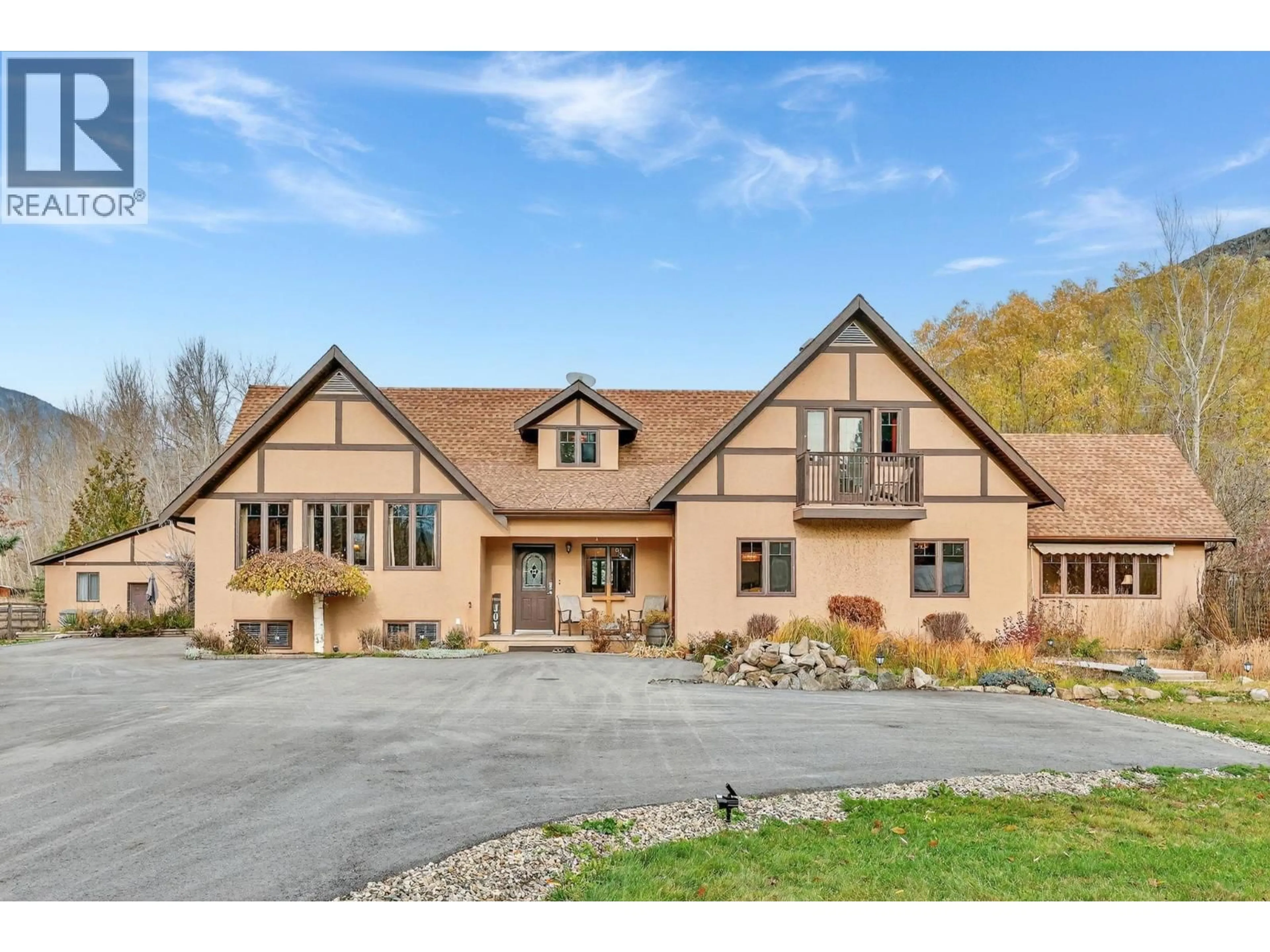 Home with brick exterior material, mountain view for 3194 JOHNSON ROAD, Salmon Arm British Columbia V1E3E6