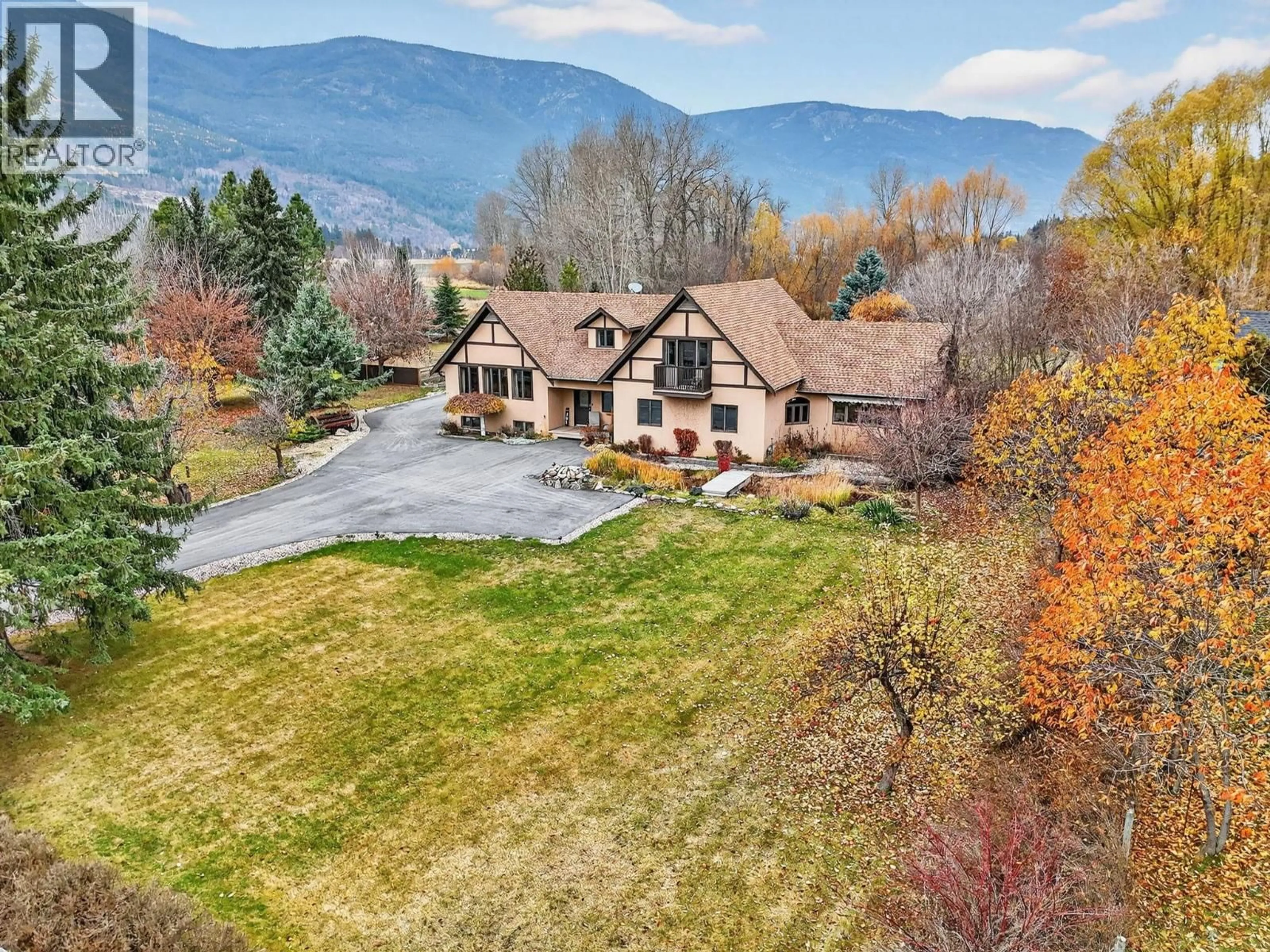 A pic from outside/outdoor area/front of a property/back of a property/a pic from drone, mountain view for 3194 JOHNSON ROAD, Salmon Arm British Columbia V1E3E6