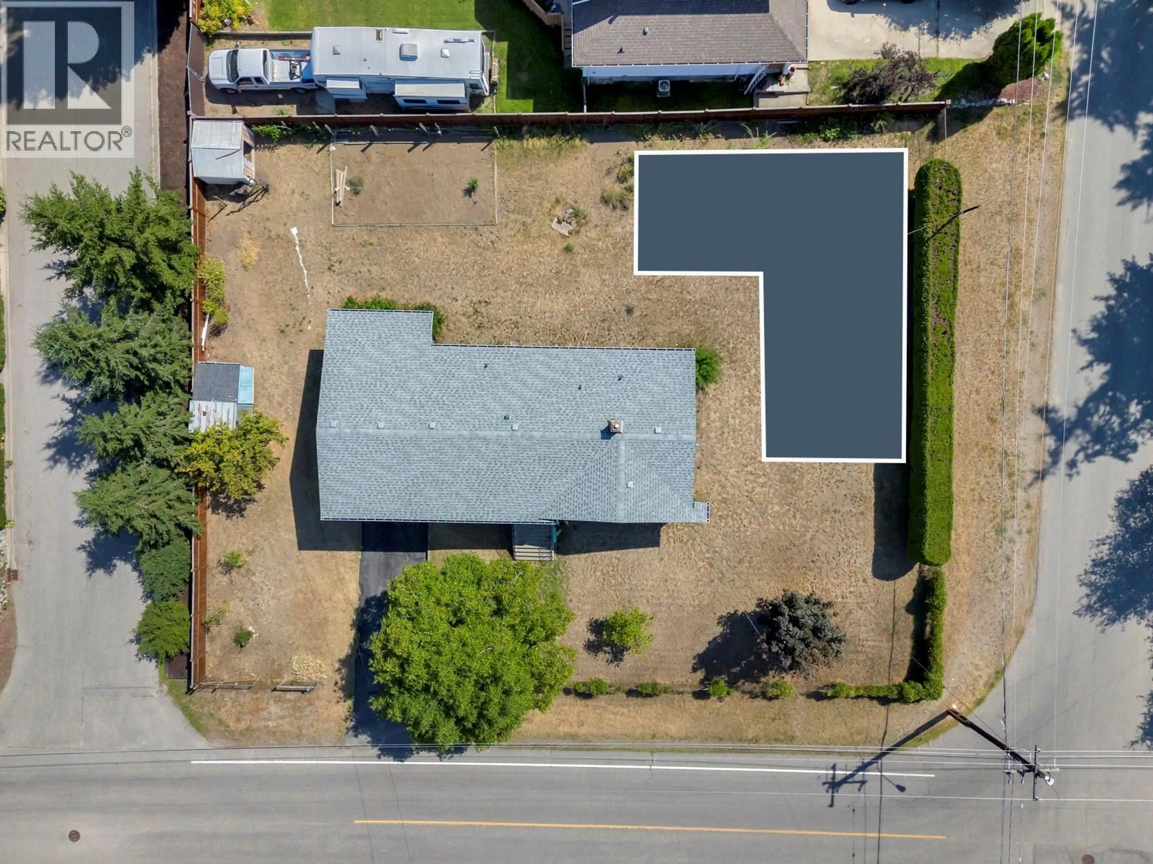 A pic from outside/outdoor area/front of a property/back of a property/a pic from drone, street for 4693 RAYMER ROAD, Kelowna British Columbia V1W1J4