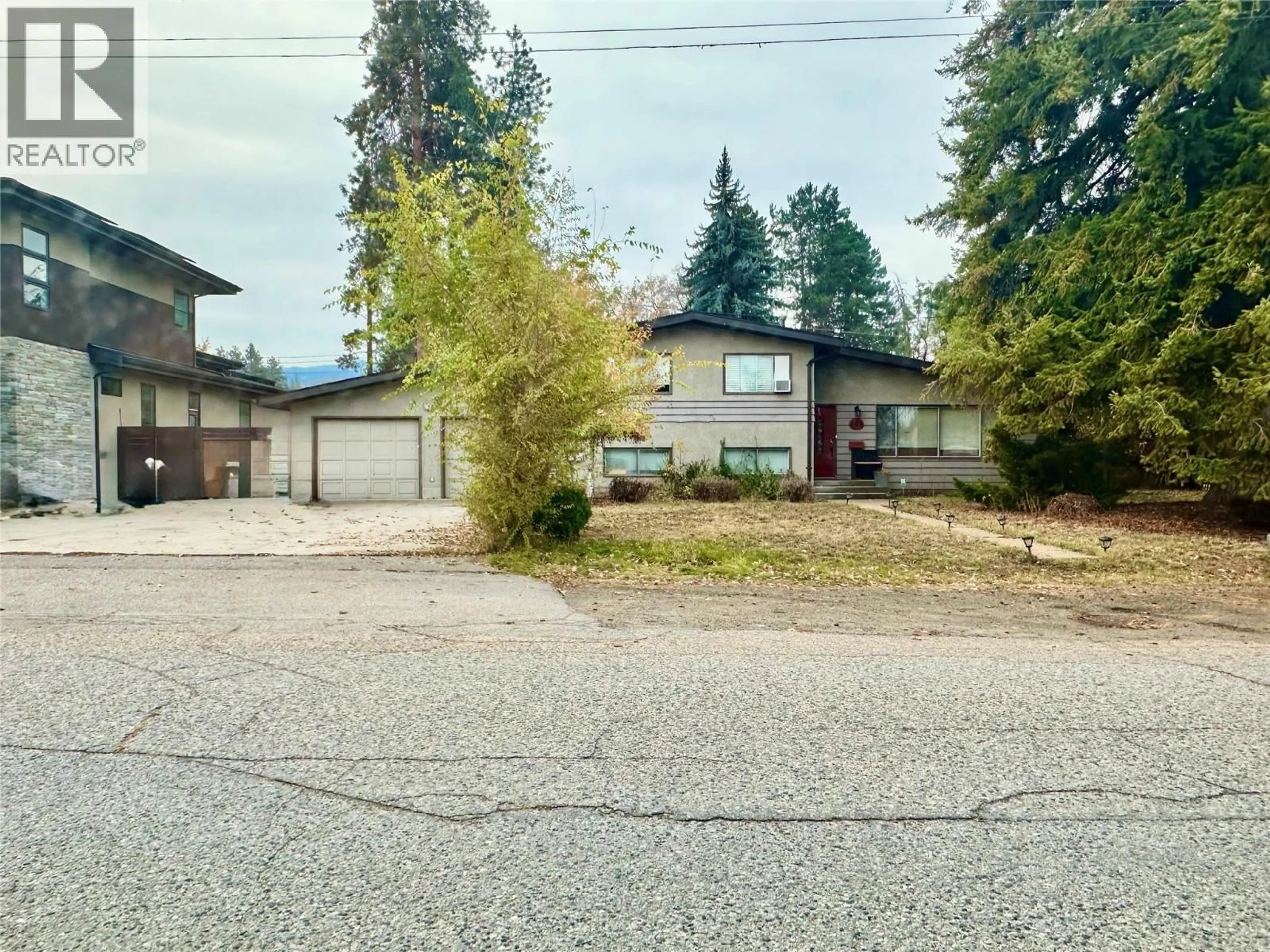A pic from outside/outdoor area/front of a property/back of a property/a pic from drone, street for 609 GREENE ROAD, Kelowna British Columbia V1W1B7