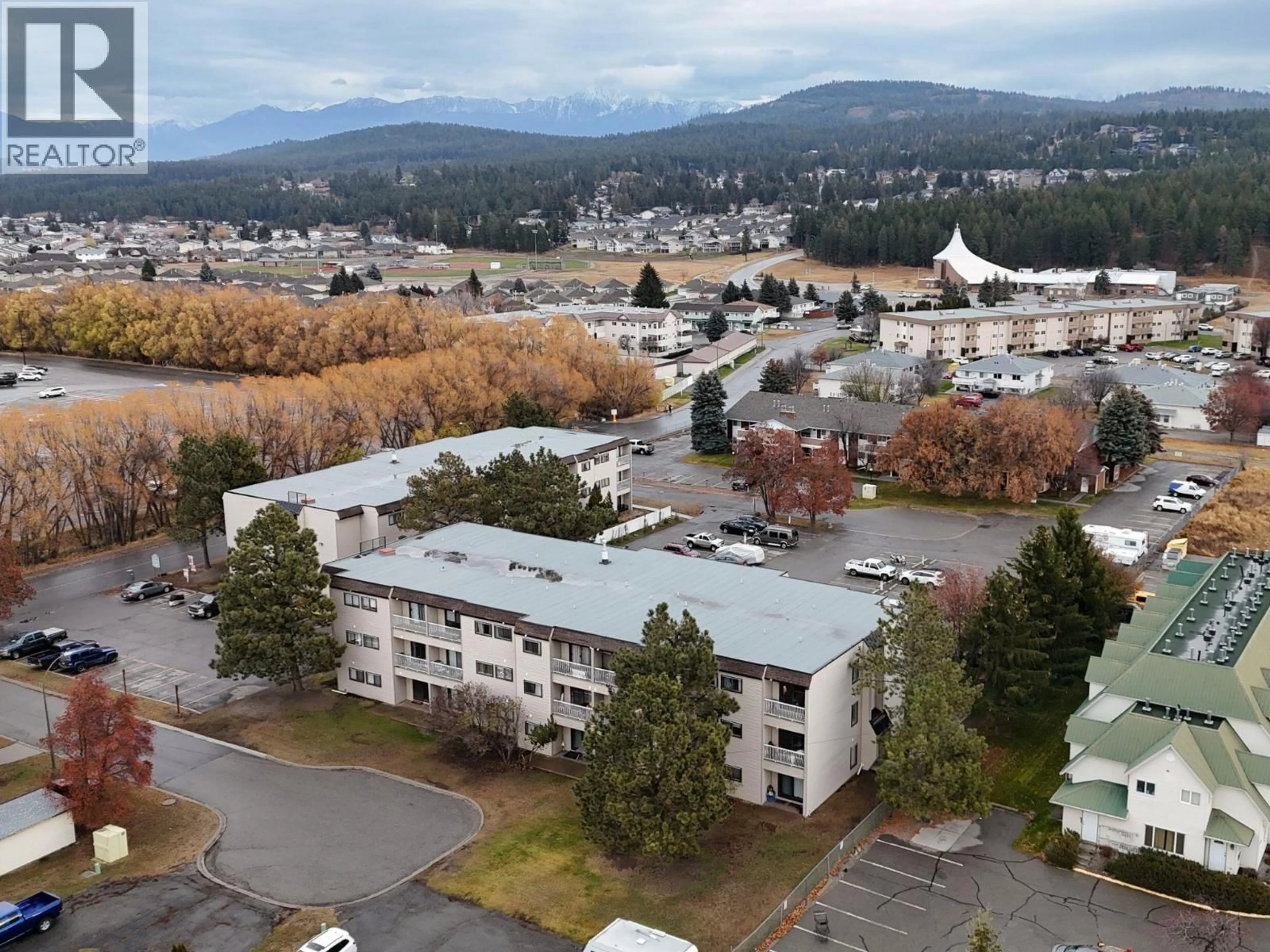 A pic from outside/outdoor area/front of a property/back of a property/a pic from drone, mountain view for 310 - 1108 23RD AVENUE NORTH, Cranbrook British Columbia V1C5T6