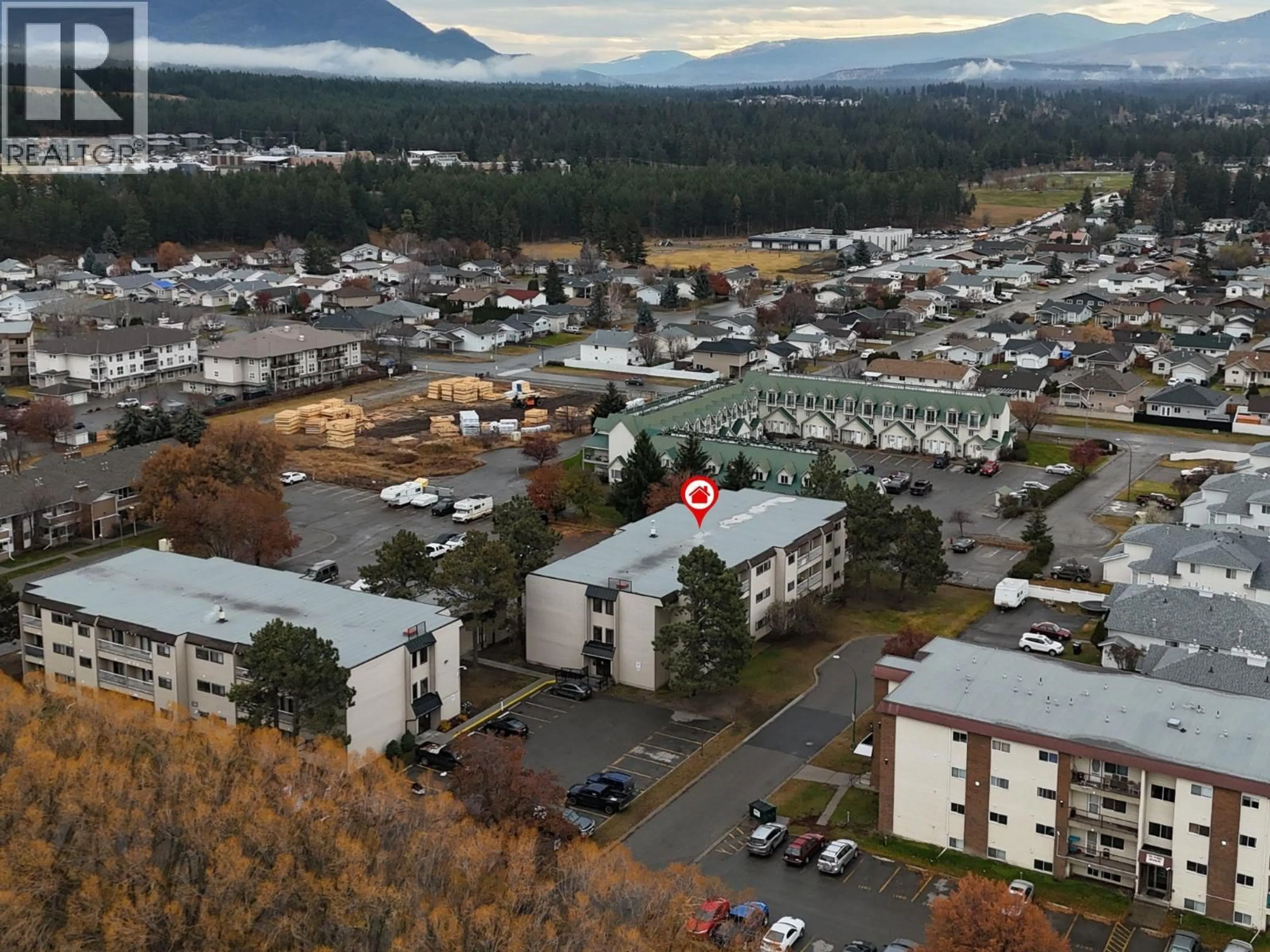 A pic from outside/outdoor area/front of a property/back of a property/a pic from drone, mountain view for 310 - 1108 23RD AVENUE NORTH, Cranbrook British Columbia V1C5T6