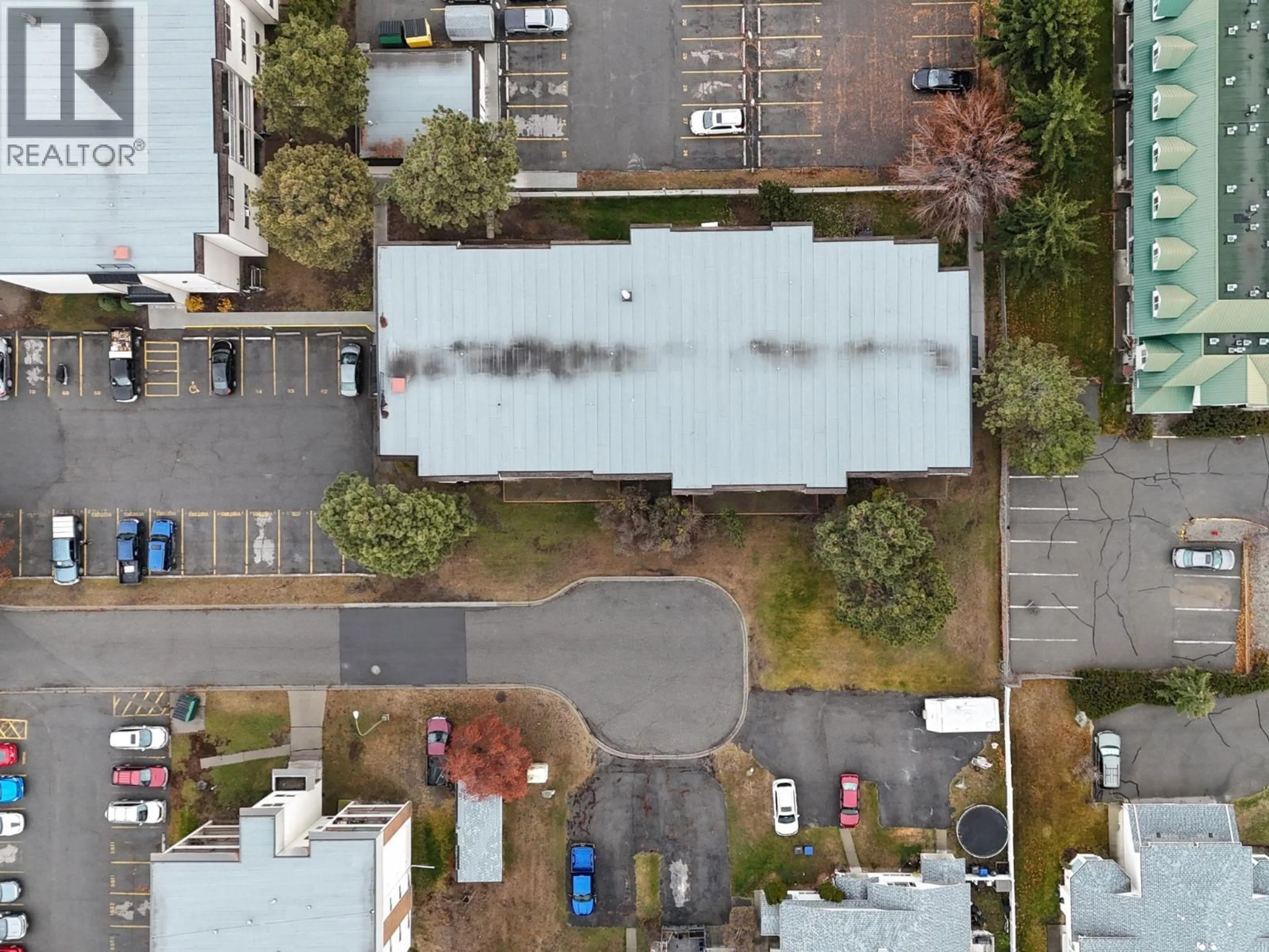A pic from outside/outdoor area/front of a property/back of a property/a pic from drone, street for 310 - 1108 23RD AVENUE NORTH, Cranbrook British Columbia V1C5T6