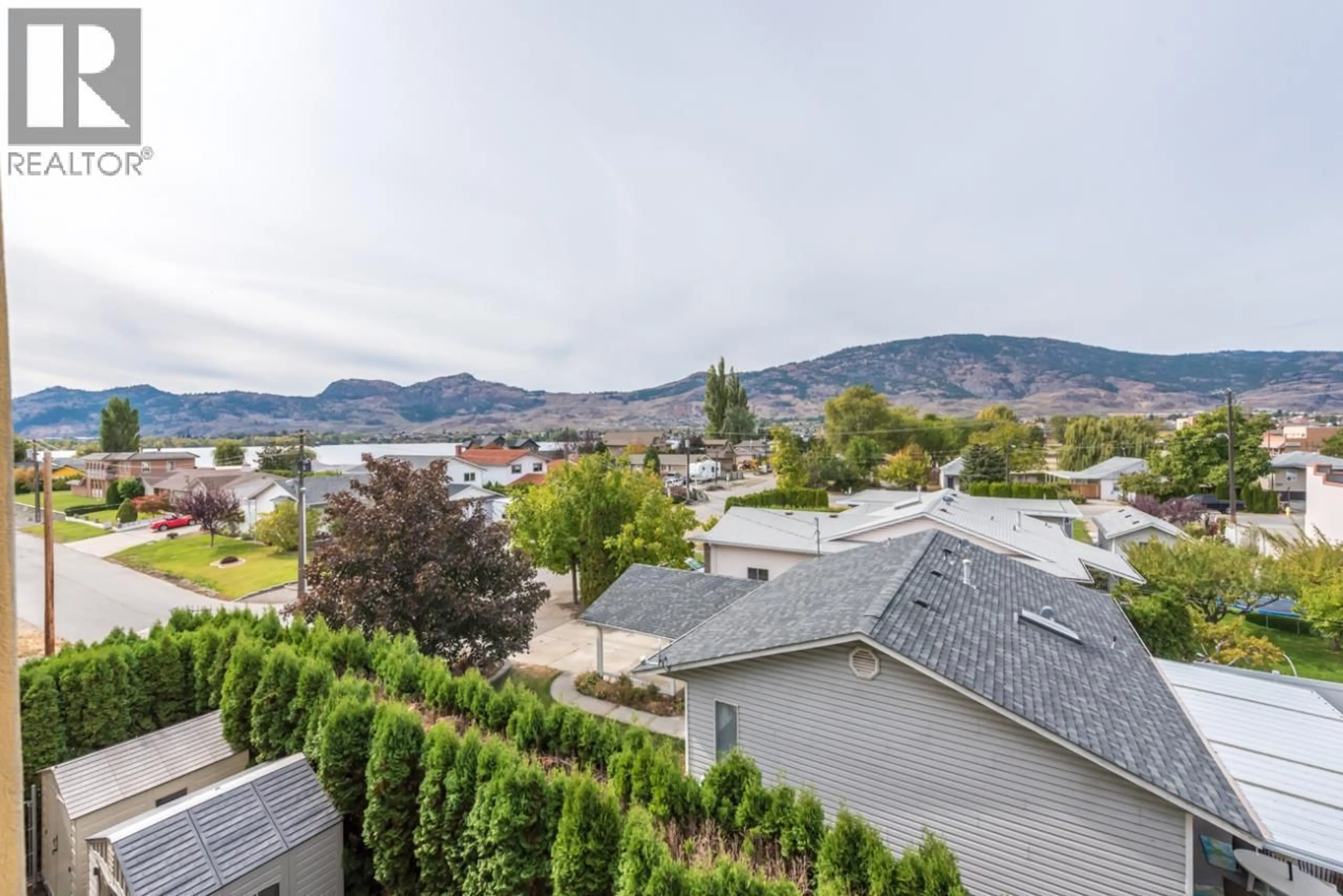 A pic from outside/outdoor area/front of a property/back of a property/a pic from drone, mountain view for 311 - 15 SOLANA KEY COURT, Osoyoos British Columbia V0H1V3