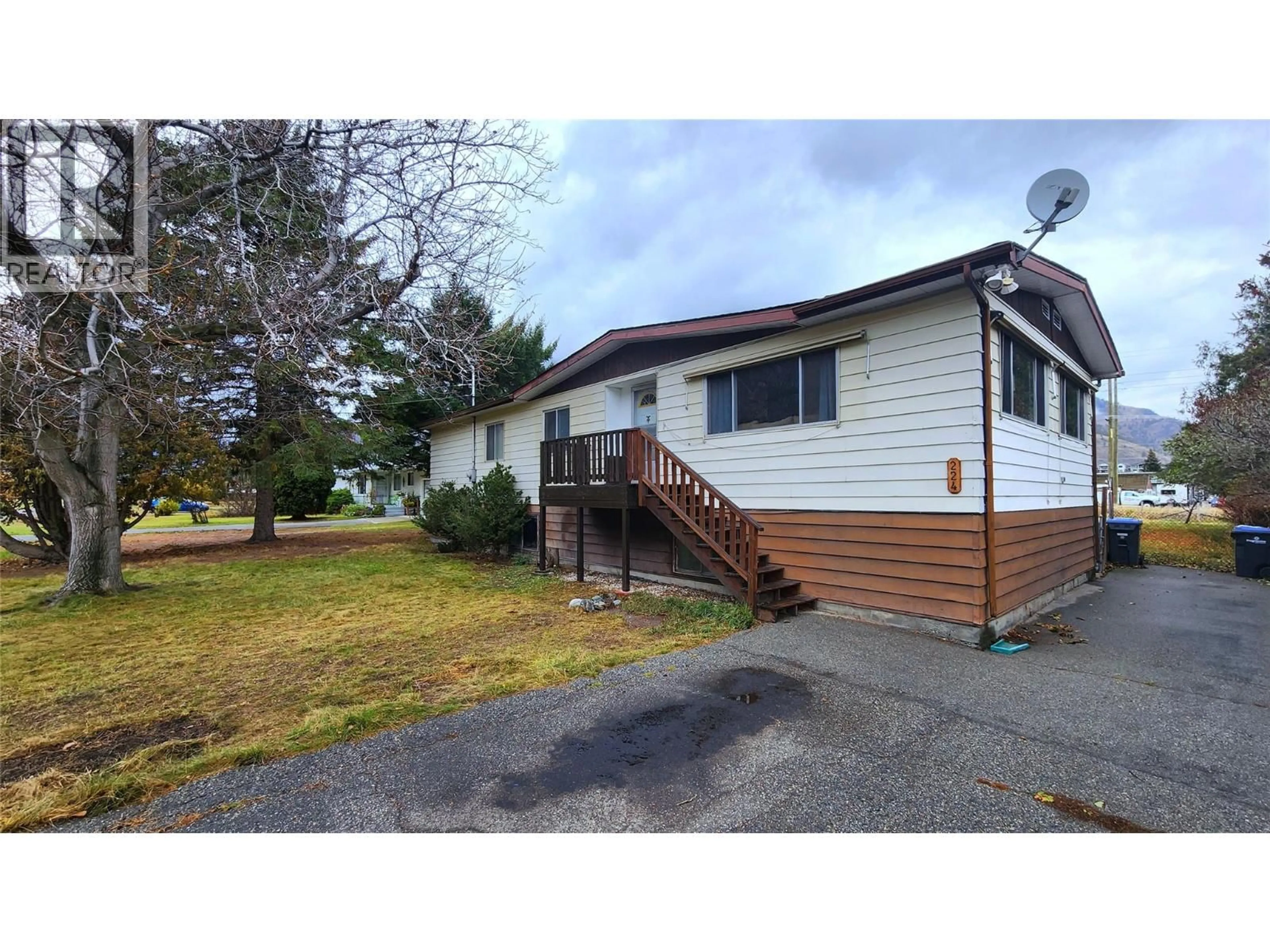 Home with vinyl exterior material, street for 224 9TH AVENUE, Keremeos British Columbia V0X1N3