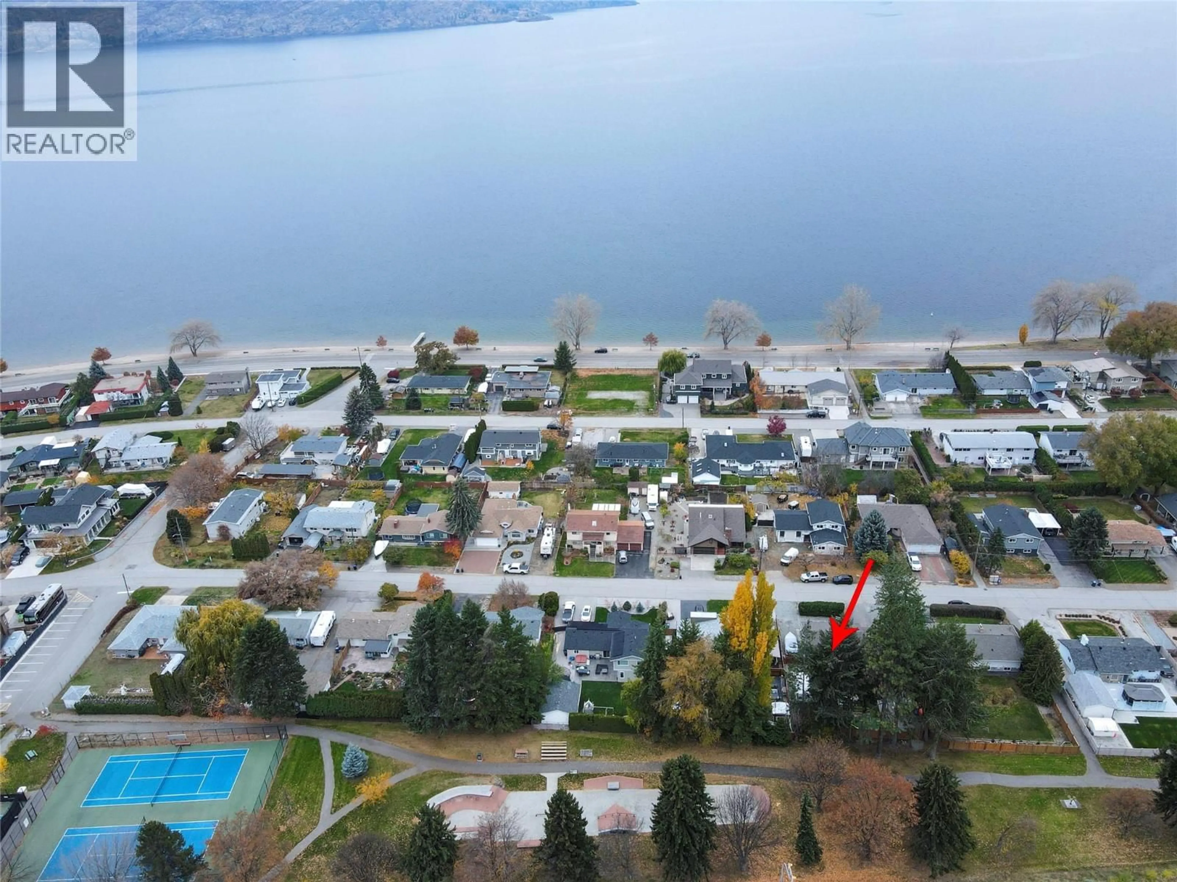 A pic from outside/outdoor area/front of a property/back of a property/a pic from drone, water/lake/river/ocean view for 4142 SAN CLEMENTE AVENUE, Peachland British Columbia V0H1X7