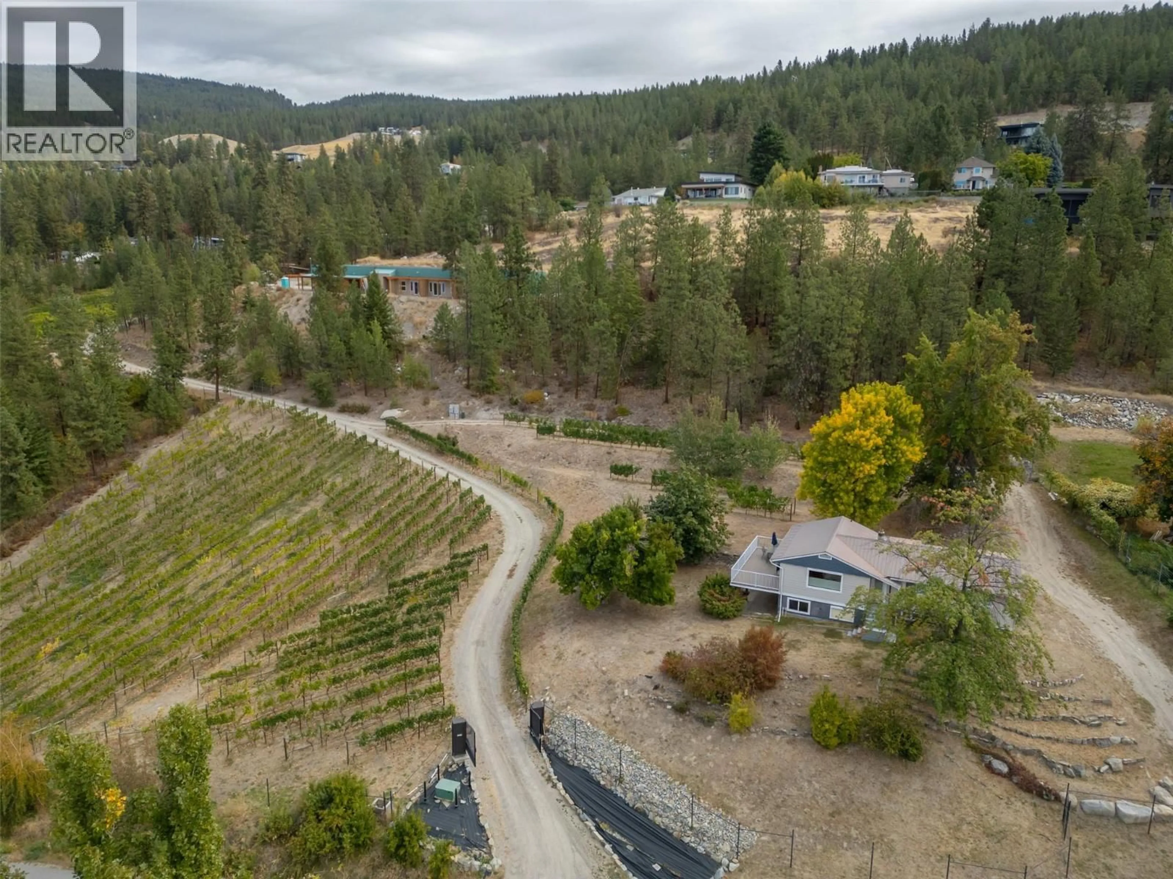 A pic from outside/outdoor area/front of a property/back of a property/a pic from drone, forest/trees view for 2864 ARAWANA ROAD, Naramata British Columbia V0H1N1