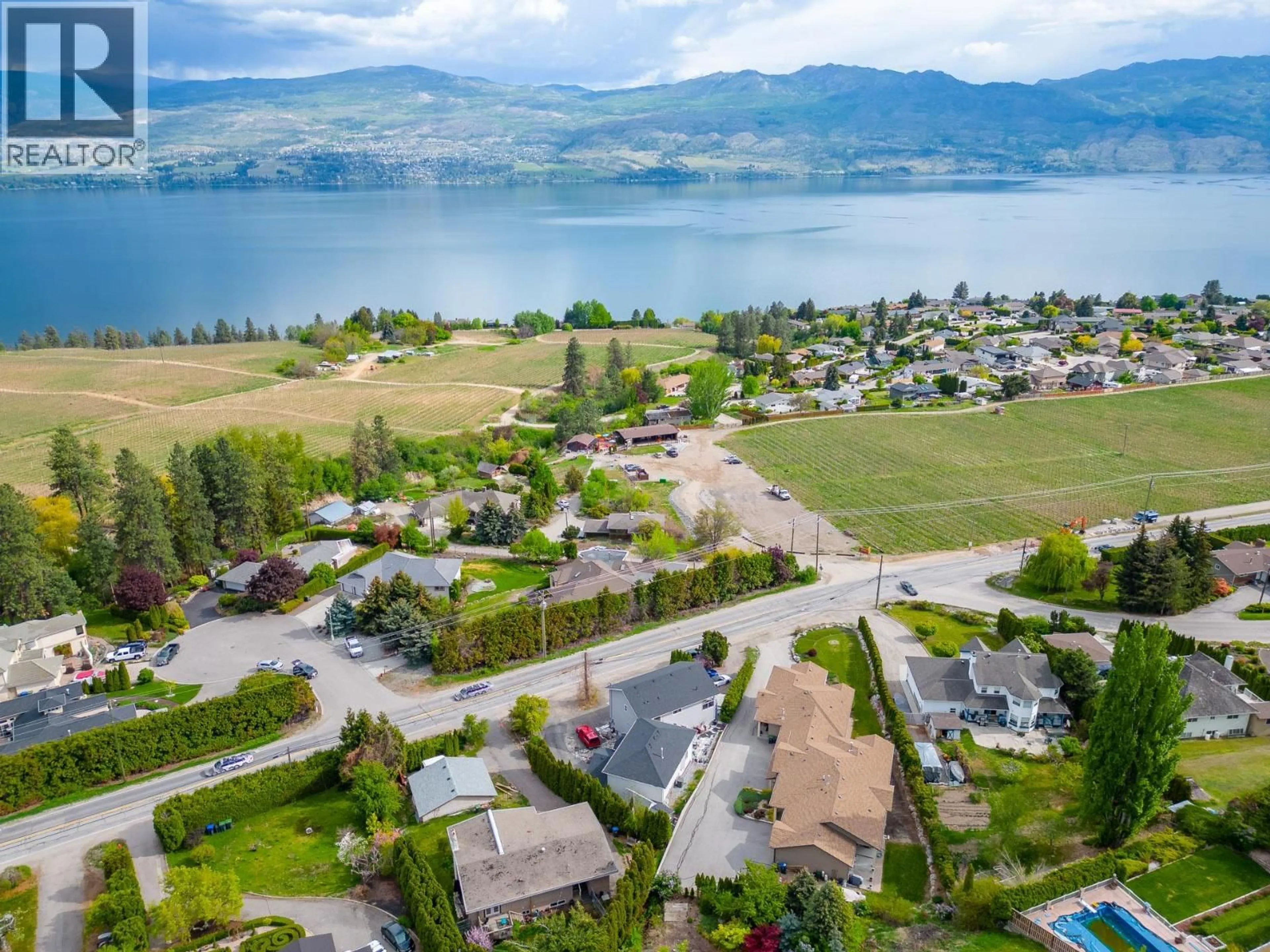 A pic from outside/outdoor area/front of a property/back of a property/a pic from drone, water/lake/river/ocean view for 3174 BOUCHERIE ROAD, West Kelowna British Columbia V1Z2G9