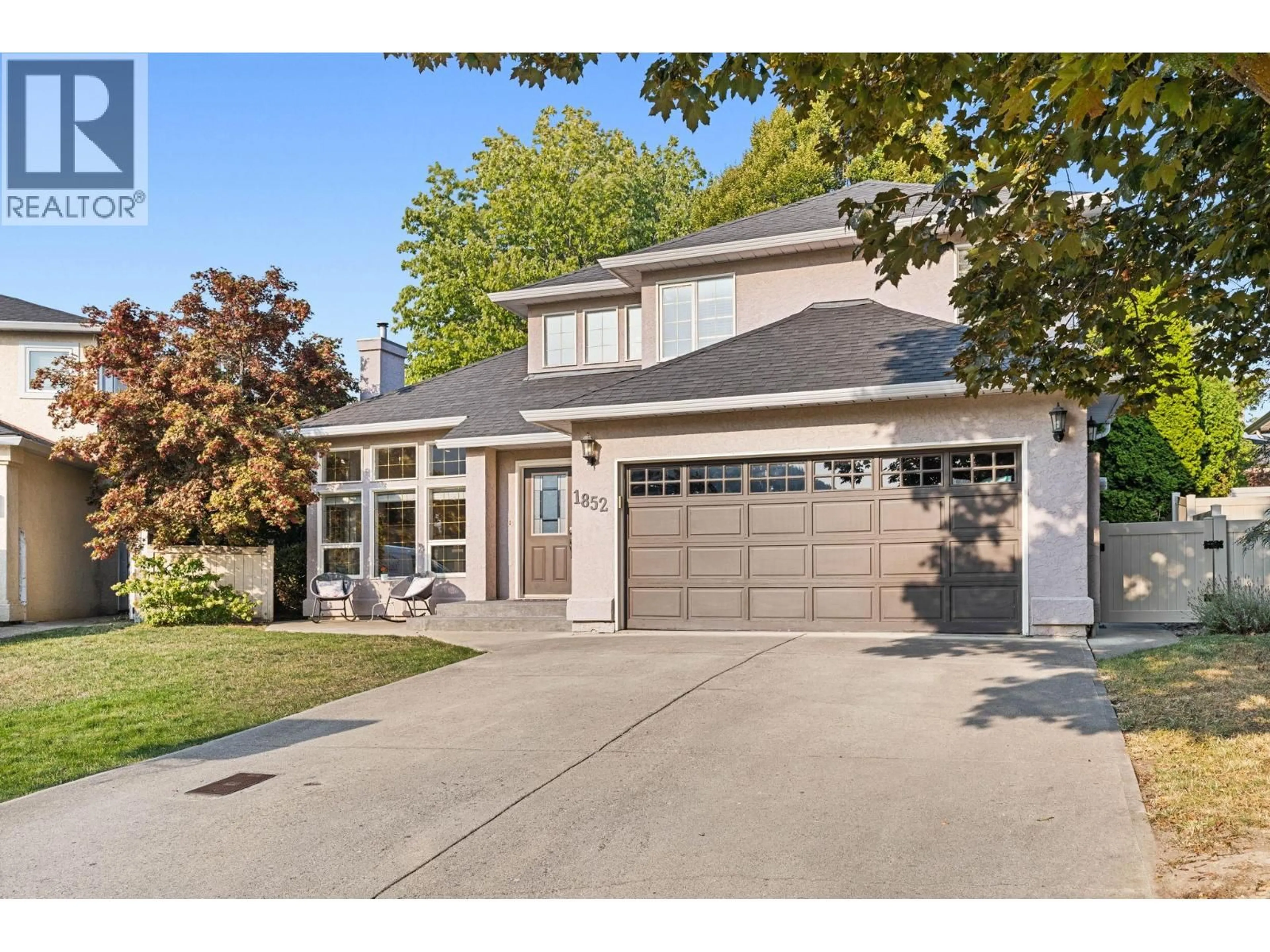 Home with brick exterior material, street for 1852 PORTLAND PLACE, Kelowna British Columbia V1V1P9