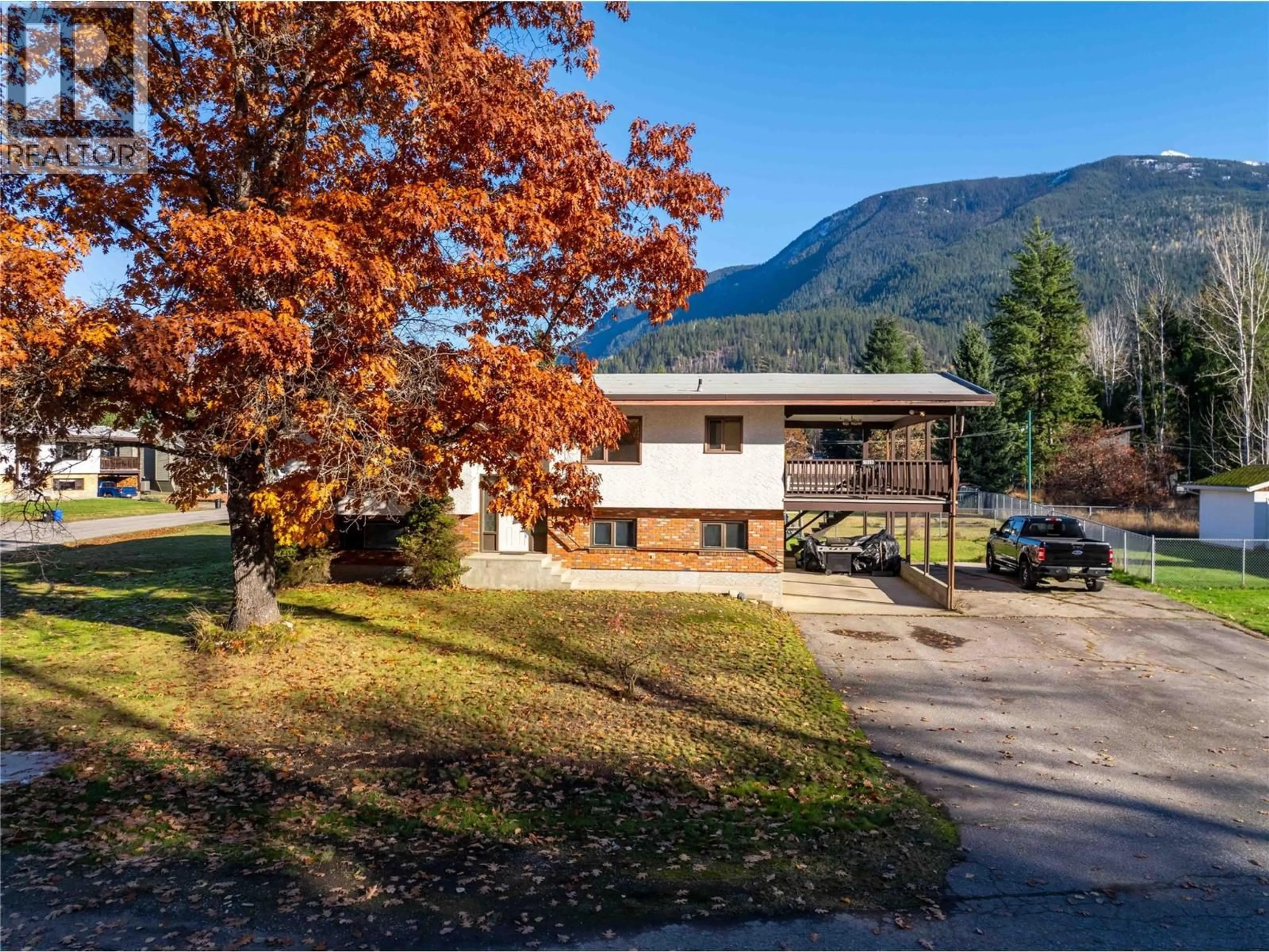 A pic from outside/outdoor area/front of a property/back of a property/a pic from drone, mountain view for 1509 MOUNTAIN VIEW DRIVE, Revelstoke British Columbia V0E2S1
