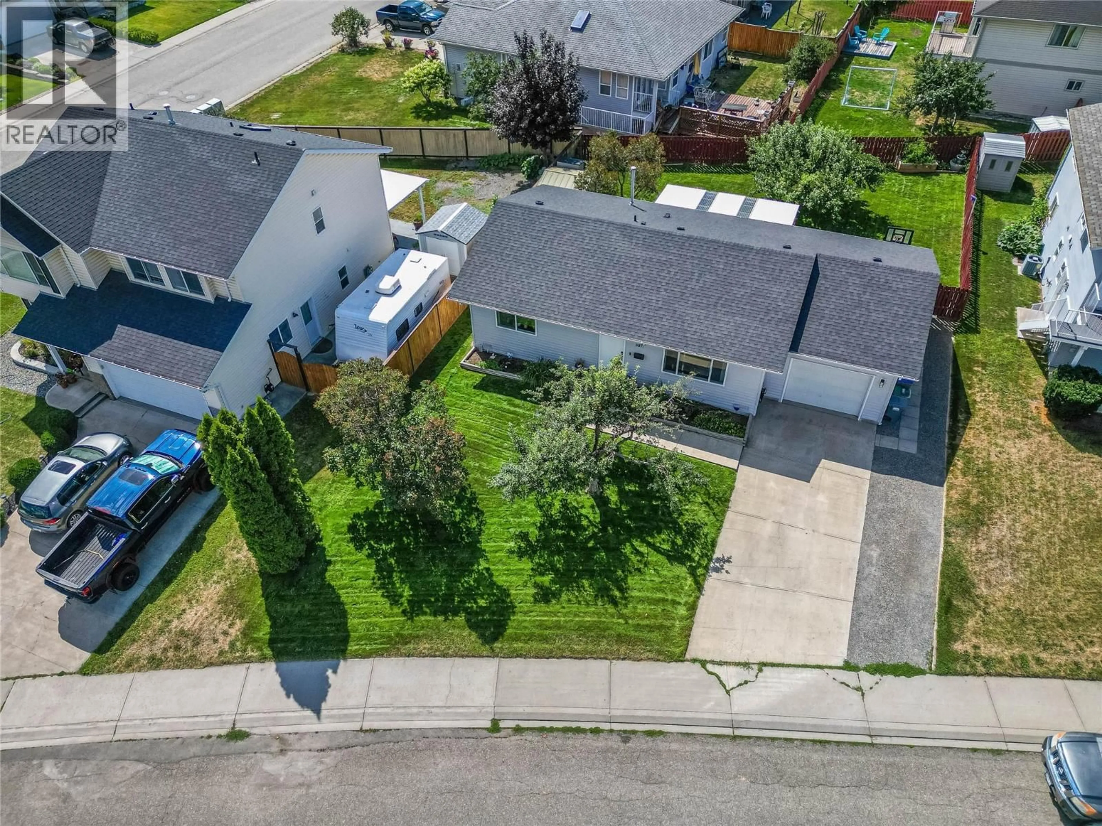 A pic from outside/outdoor area/front of a property/back of a property/a pic from drone, street for 8871 BADGER DRIVE, Kamloops British Columbia V2C6V2