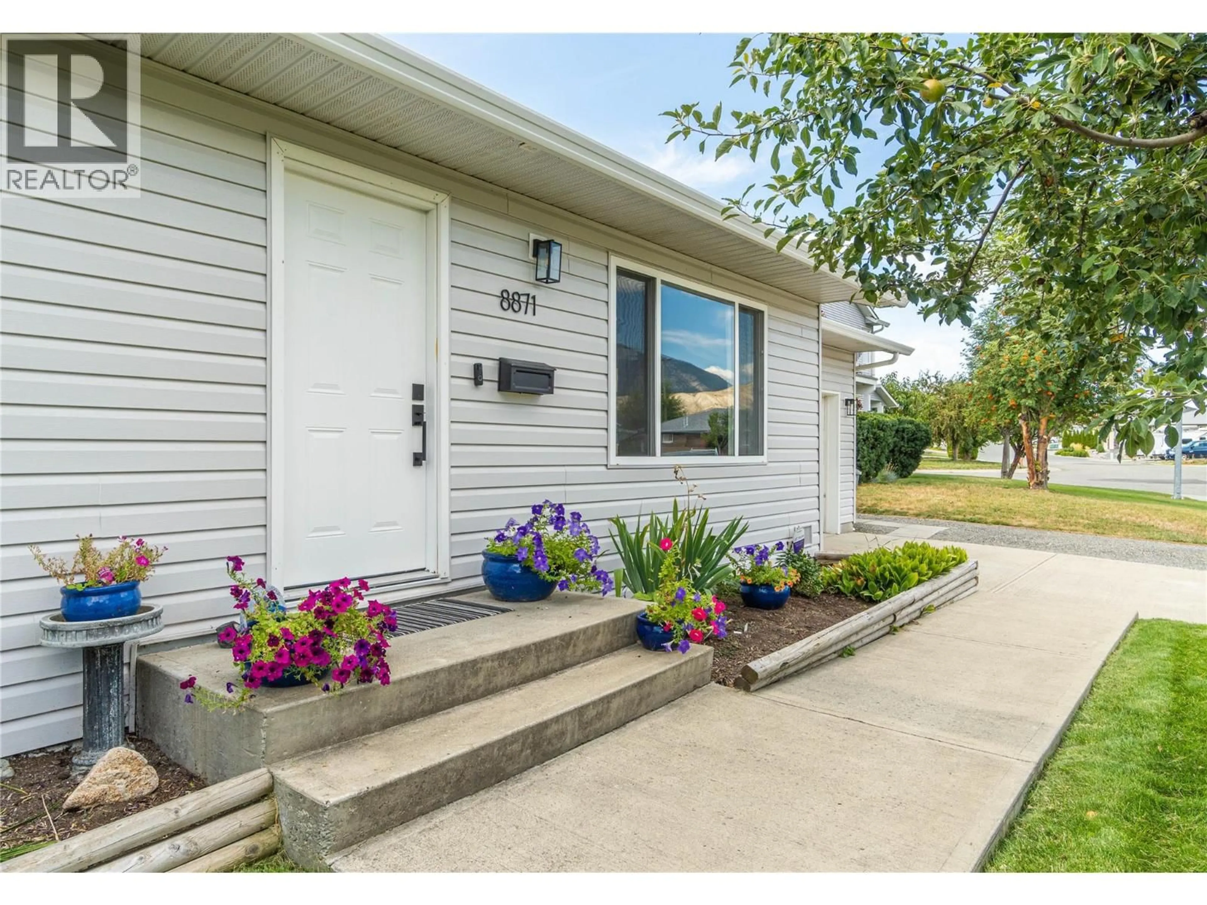 Home with vinyl exterior material, street for 8871 BADGER DRIVE, Kamloops British Columbia V2C6V2