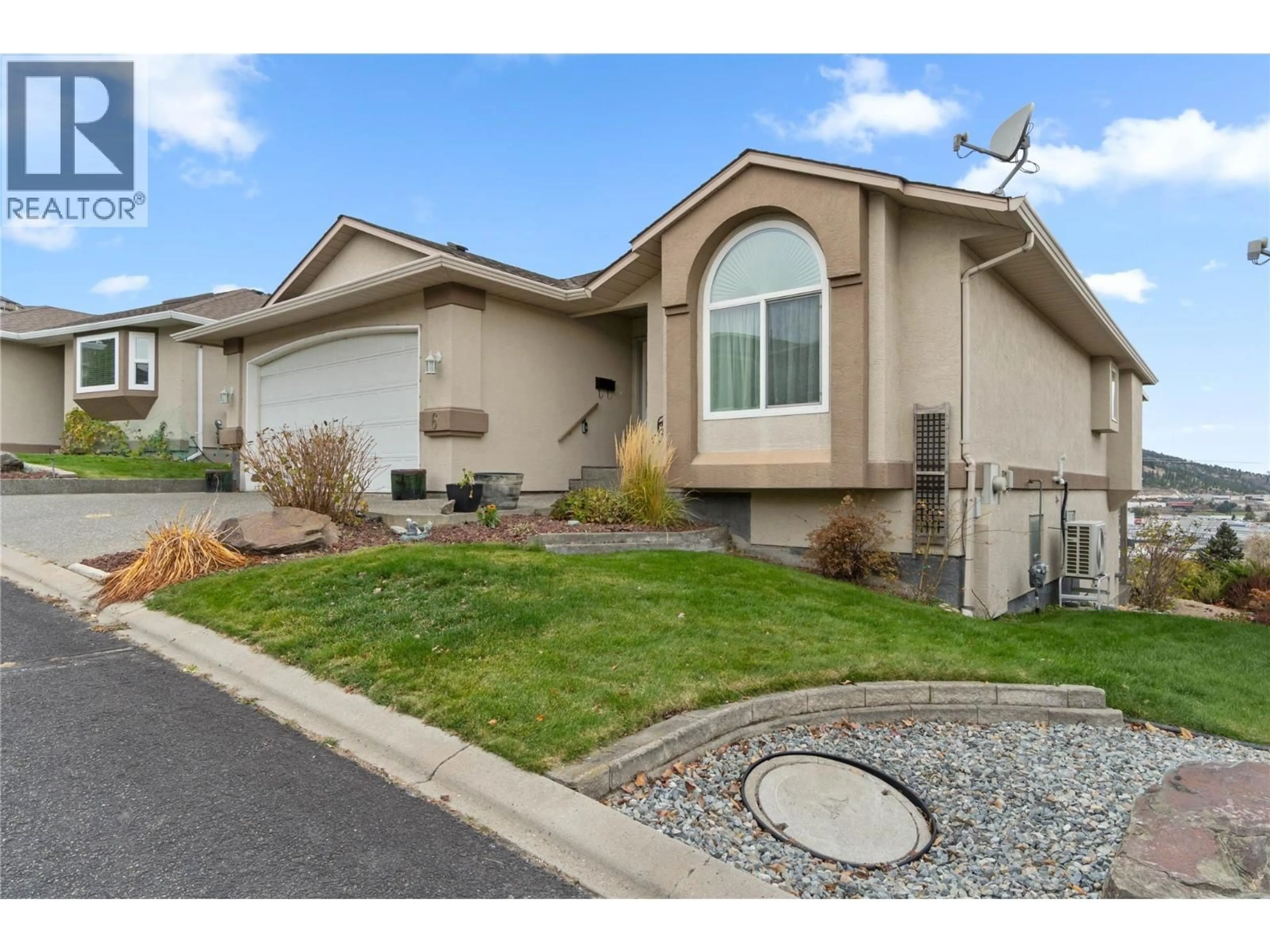 Home with vinyl exterior material, street for 6 - 1575 SPRINGHILL DRIVE, Kamloops British Columbia V2E2N9